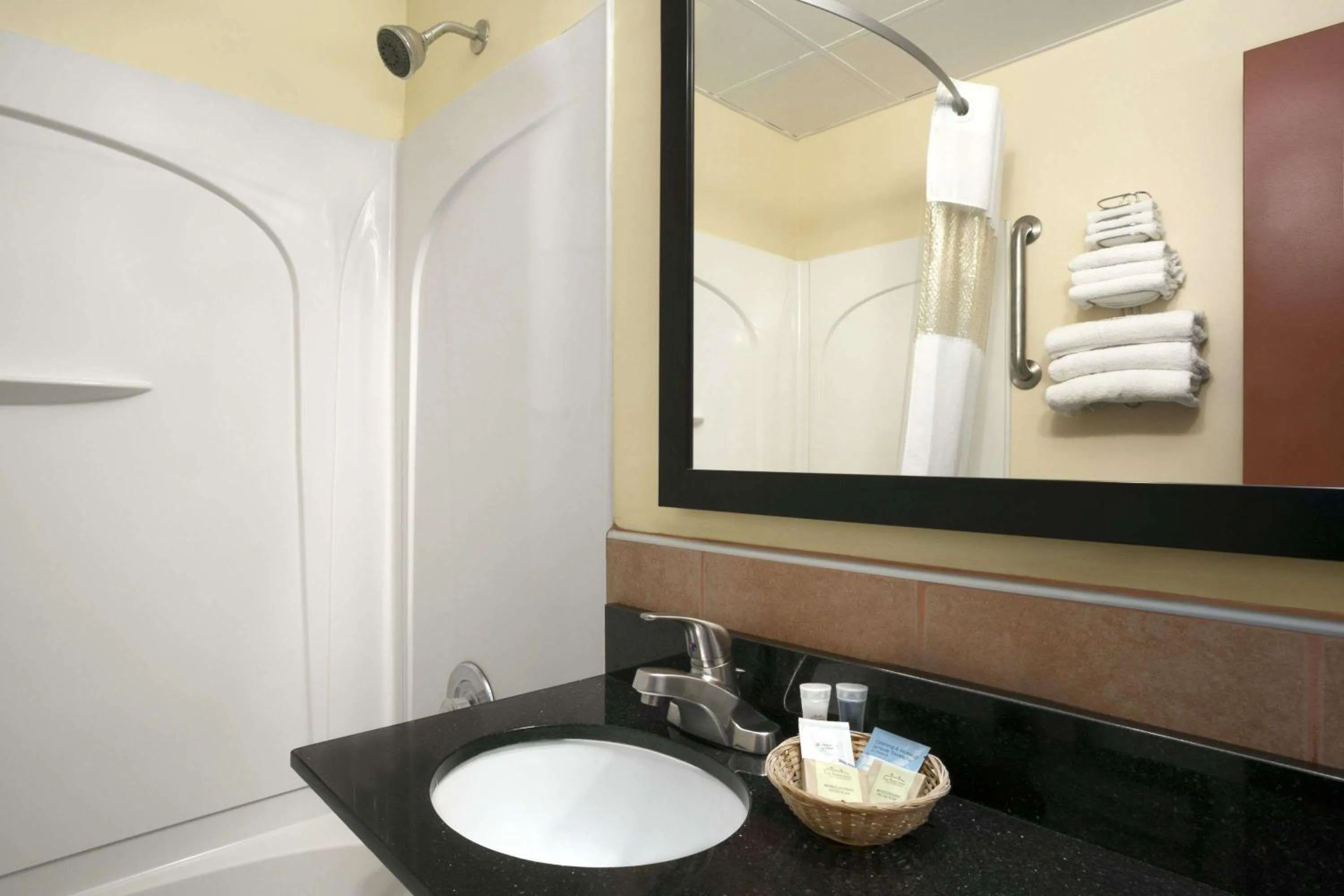 Bathroom in Travelodge by Wyndham Cleveland Lakewood