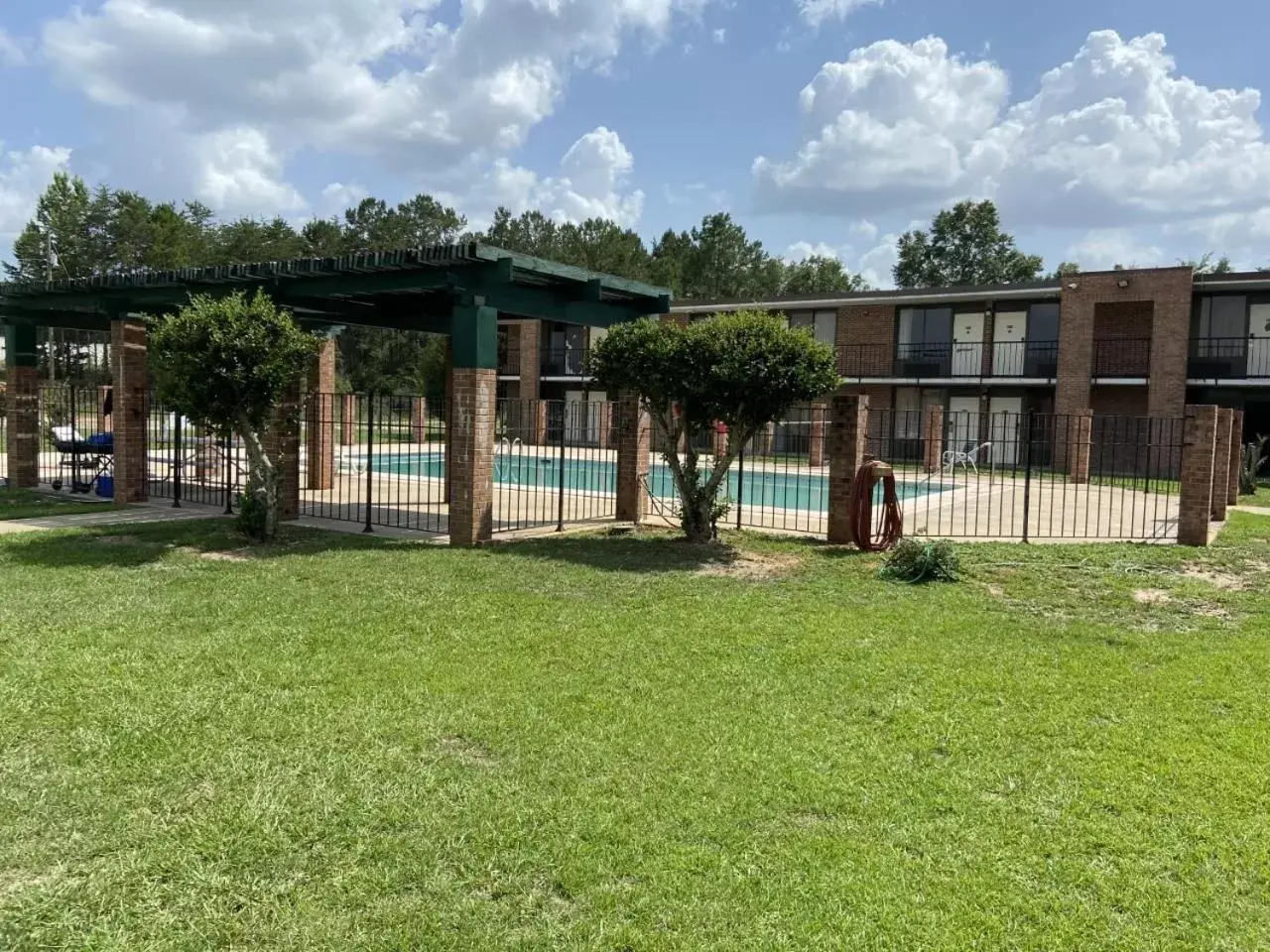 Swimming pool, Property Building in Days Inn by Wyndham Ozark