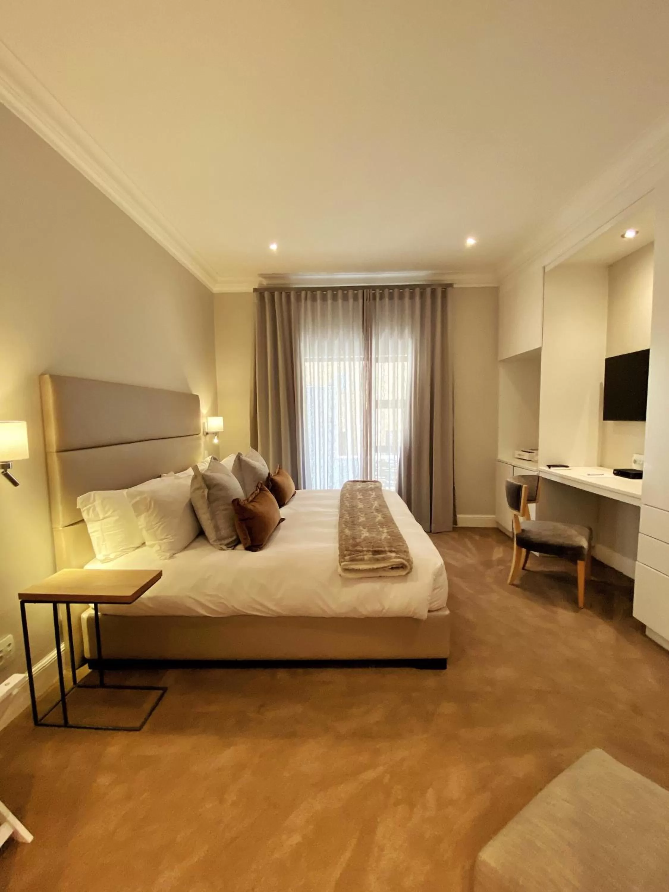 Bed in The Northcliff Boutique Hotel