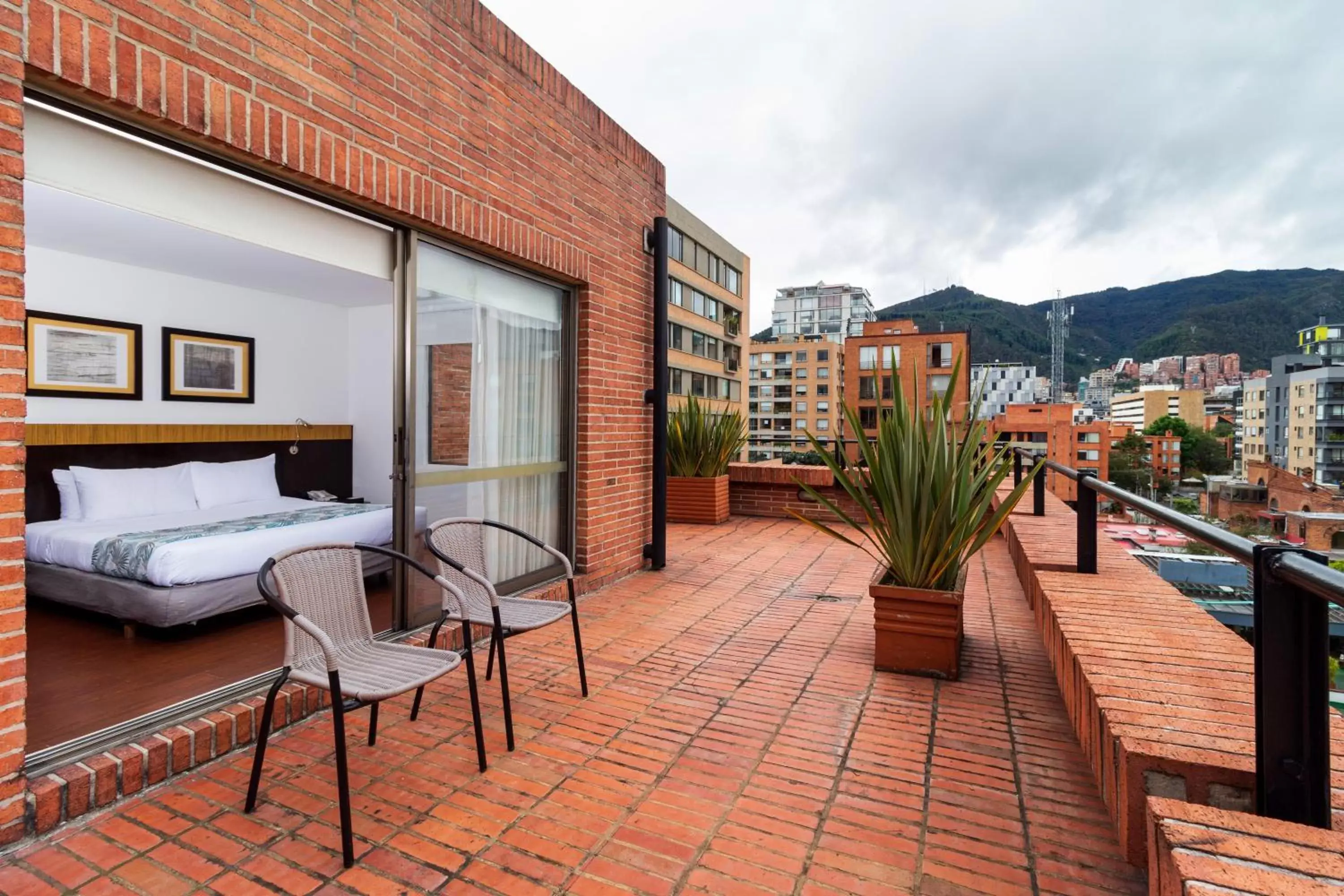 Balcony/Terrace in Hotel Madisson Inn Luxury By GEH Suites