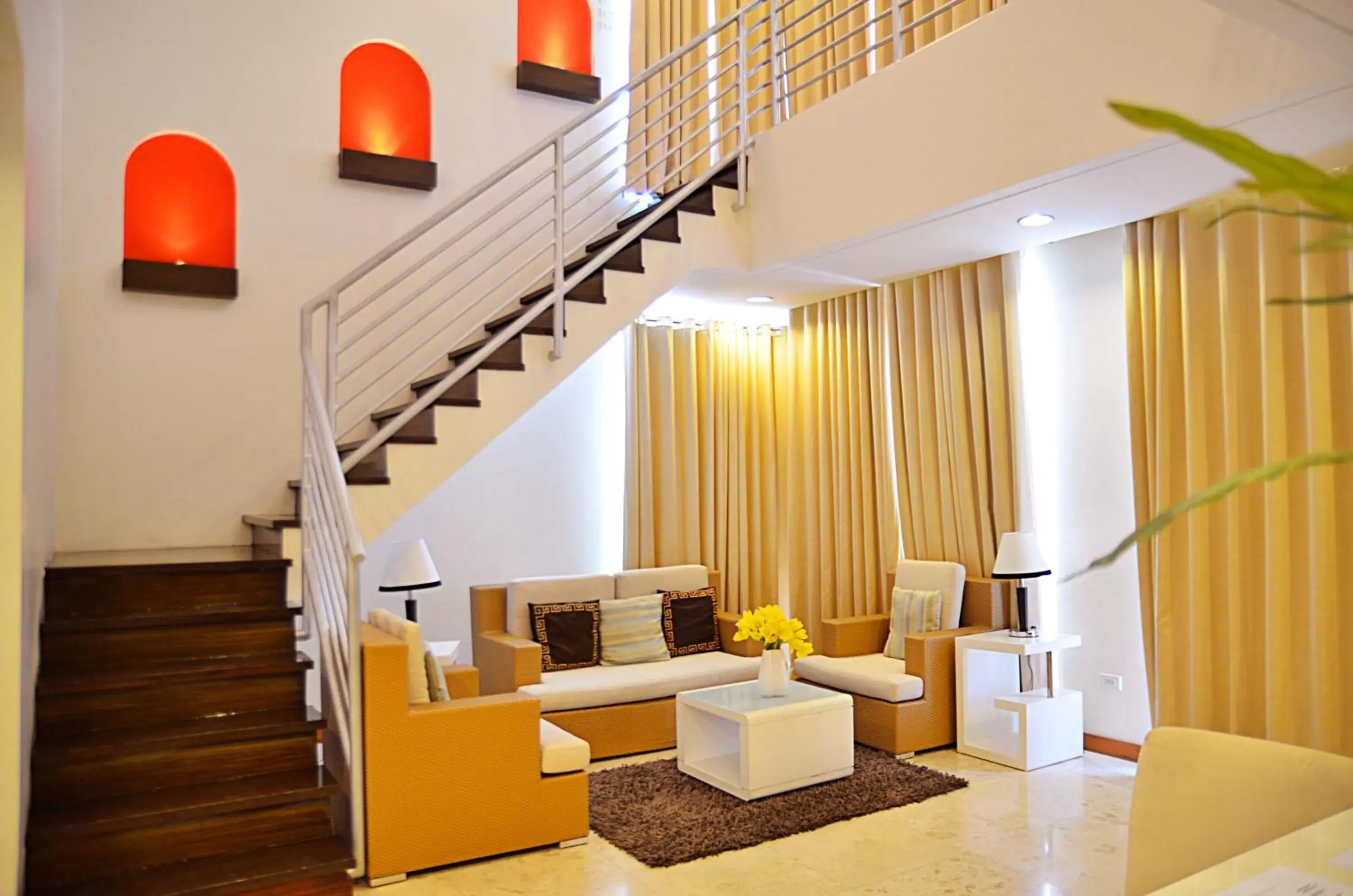 Living room, Seating Area in Thunderbird Resorts - Poro Point