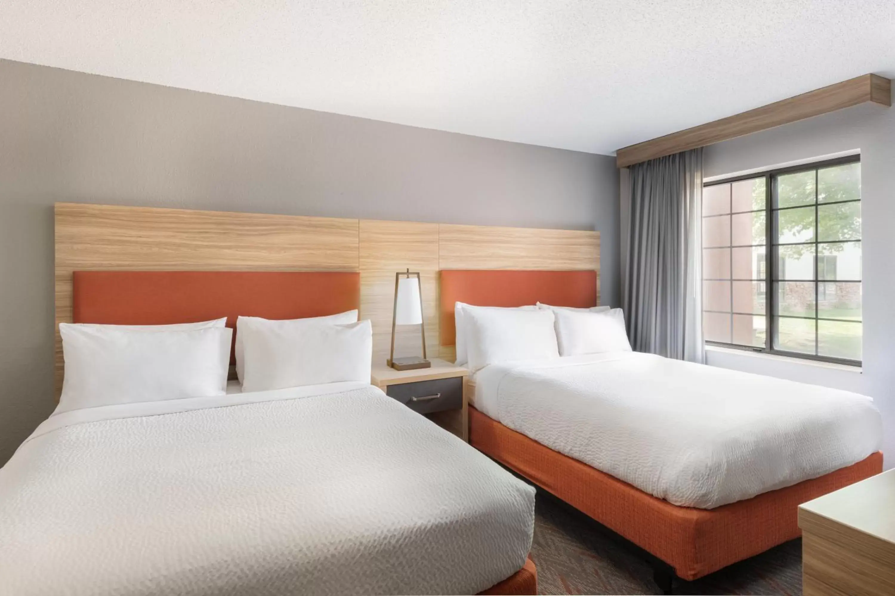 Bed in Candlewood Suites Eagan - Mall of America Area, an IHG Hotel