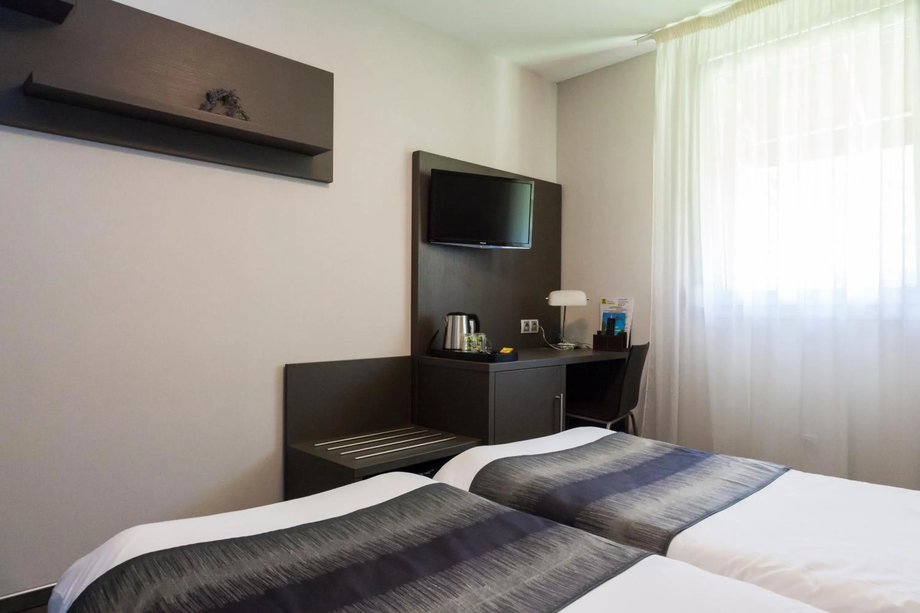 Photo of the whole room, Bed in Logis Hôtel Le Mas De Jossyl