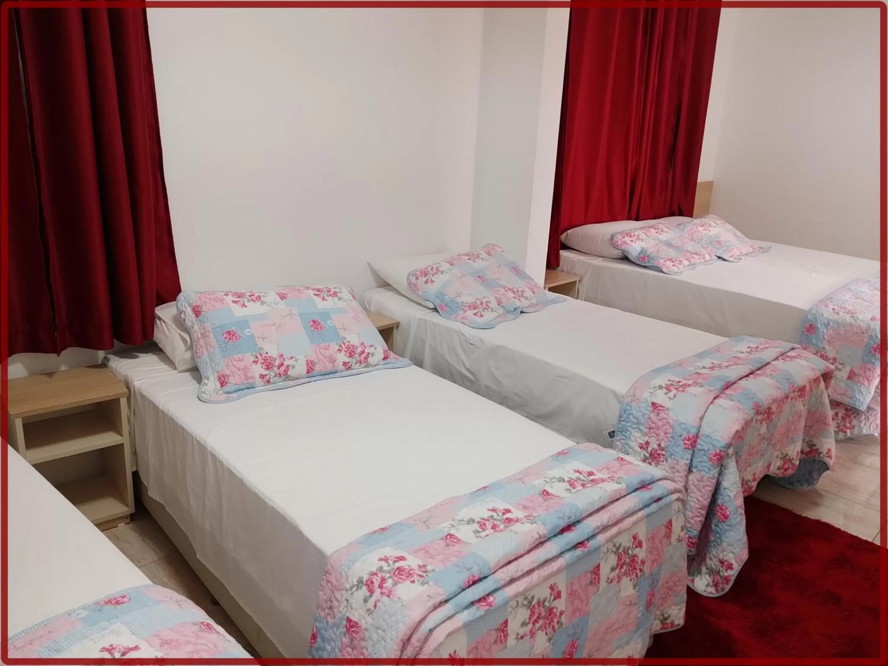 Bed in Hotel Anjos LTDA