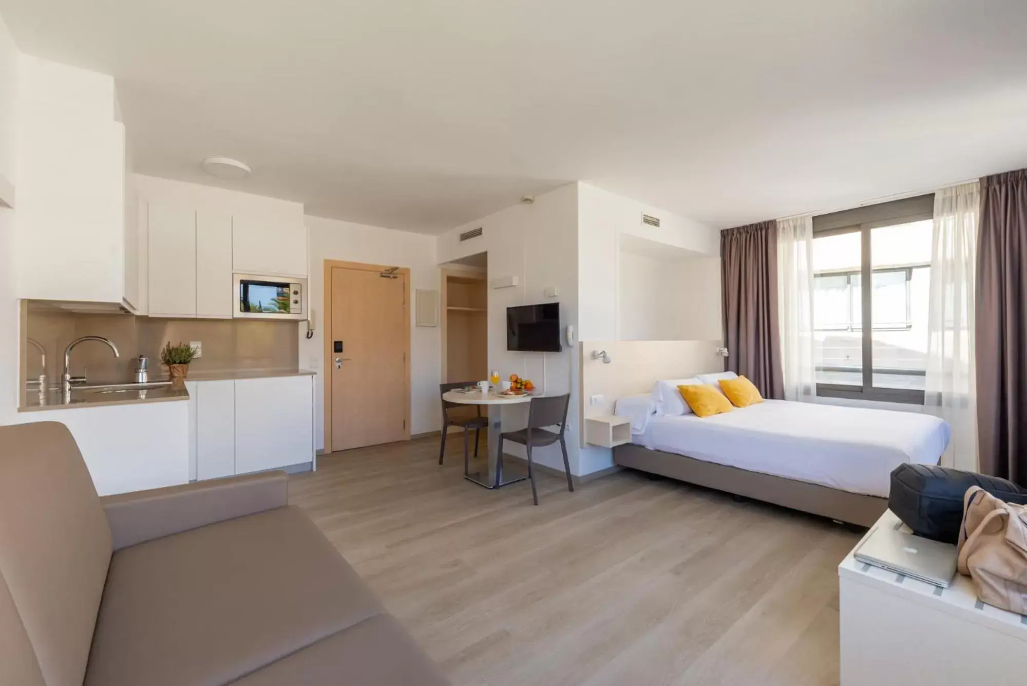 Photo of the whole room, Bed in Atenea Park Suites & Apartments Photo of the whole room, Bed in Atenea Park Suites & Apartments