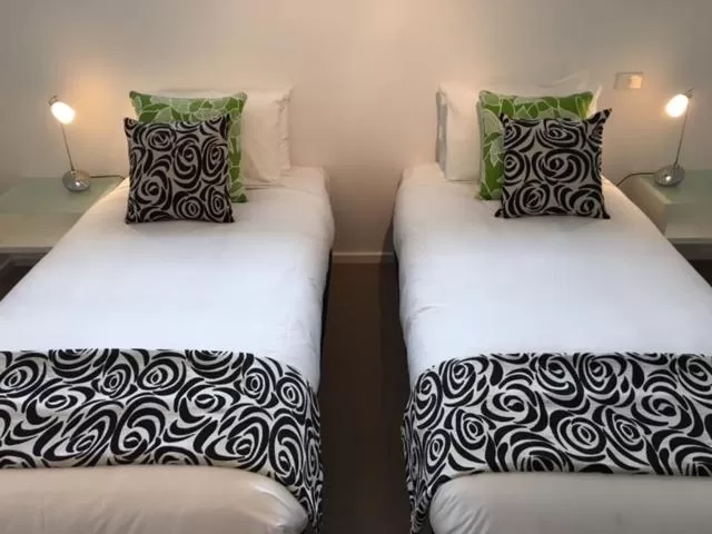 Bed in Ashmont Motel and Apartments