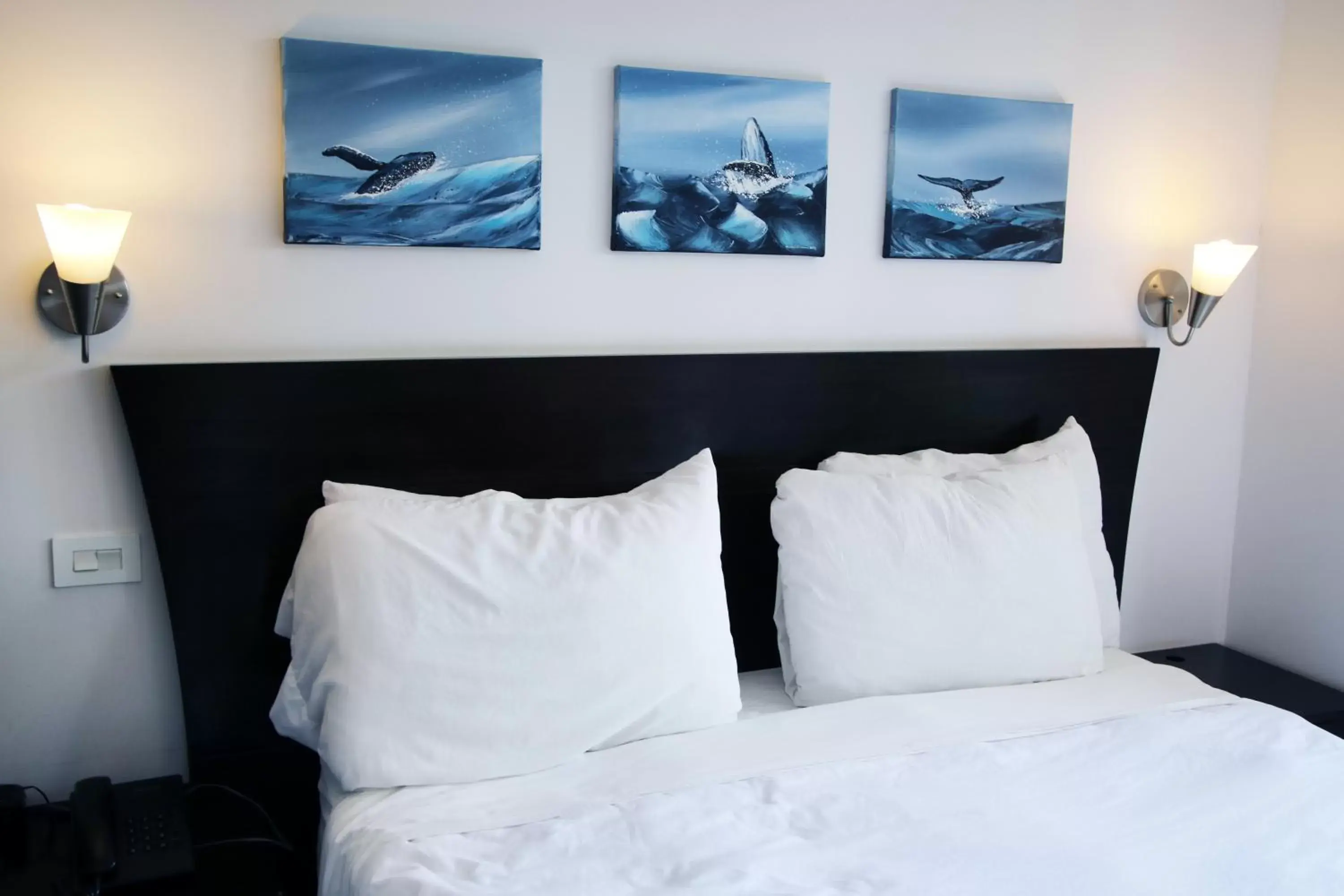 Bed in Oceano Boutique Hotel & Gallery