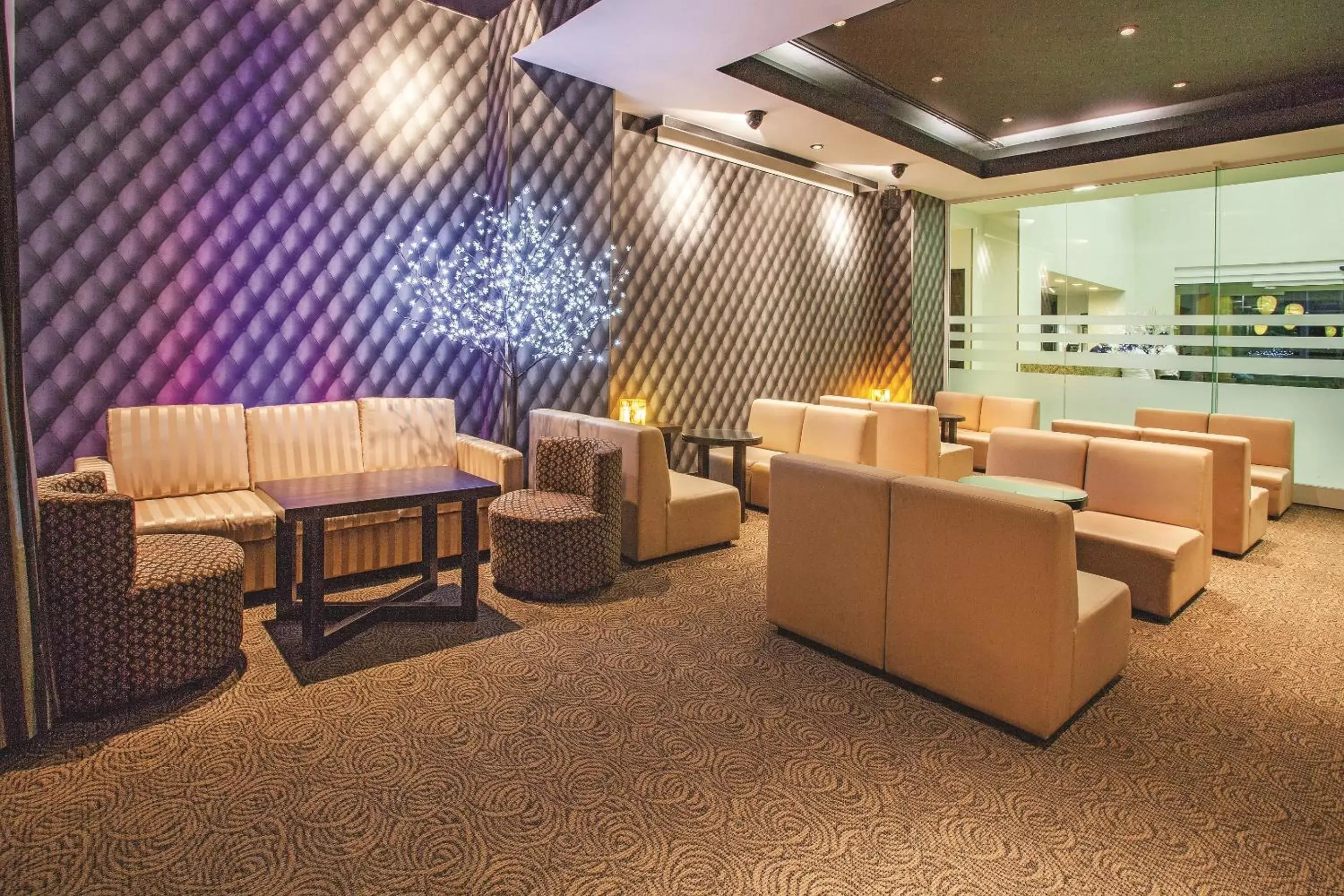 Lounge or bar in La Quinta by Wyndham Poza Rica