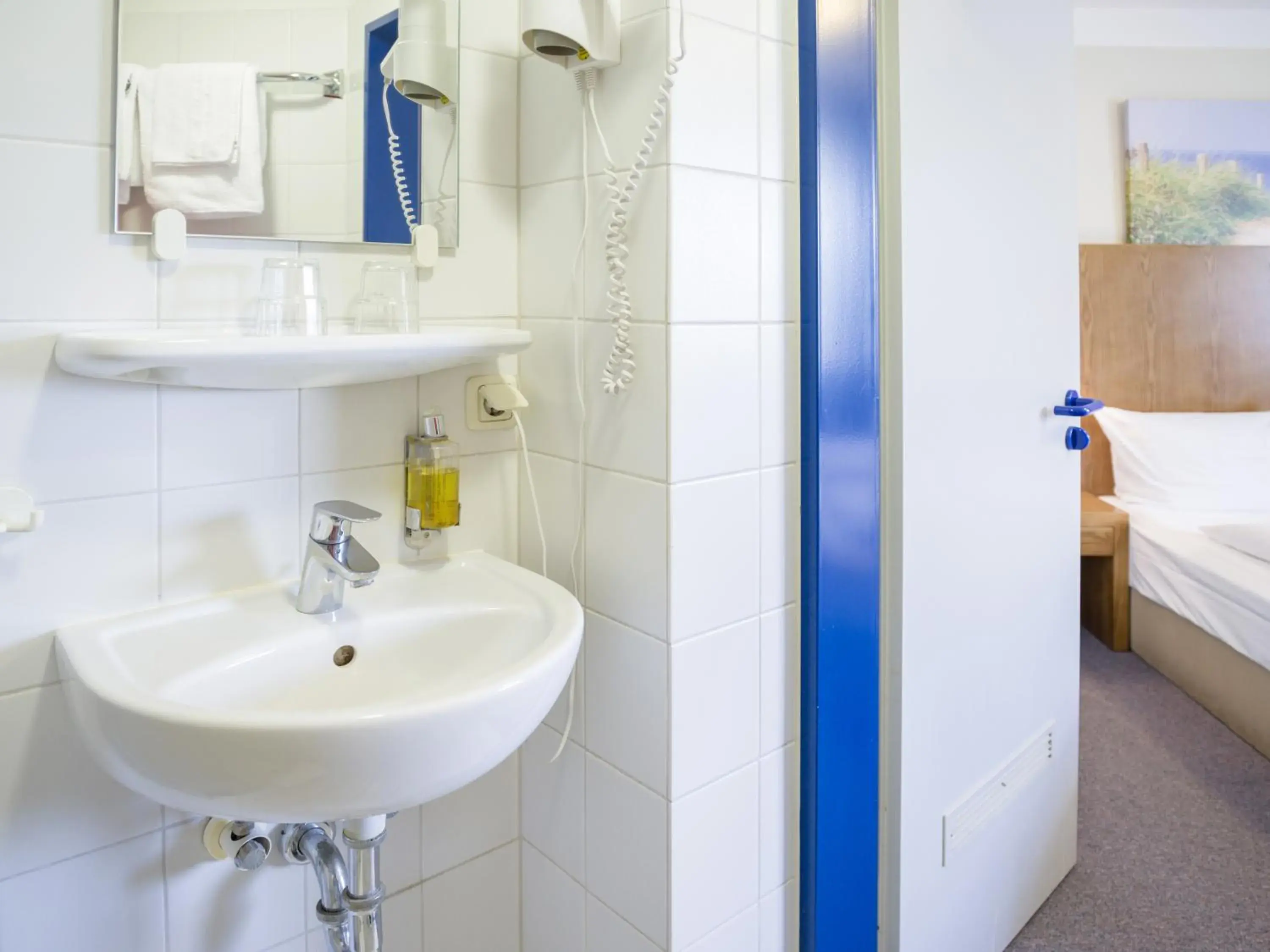 Bathroom in Hotel Koenigstein Kiel by Tulip Inn