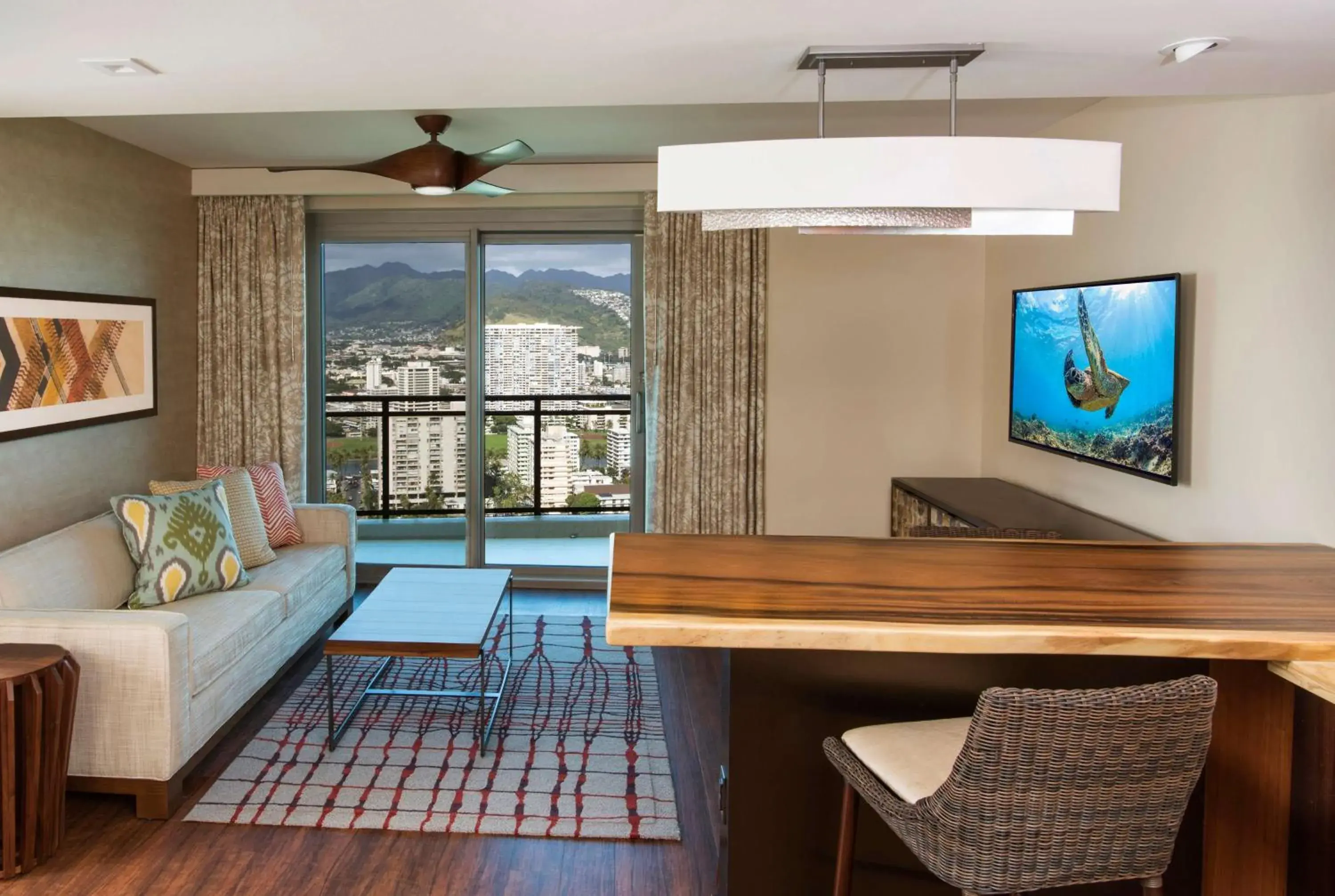 Living room, Seating Area in Hilton Grand Vacation Club The Grand Islander Waikiki Honolulu