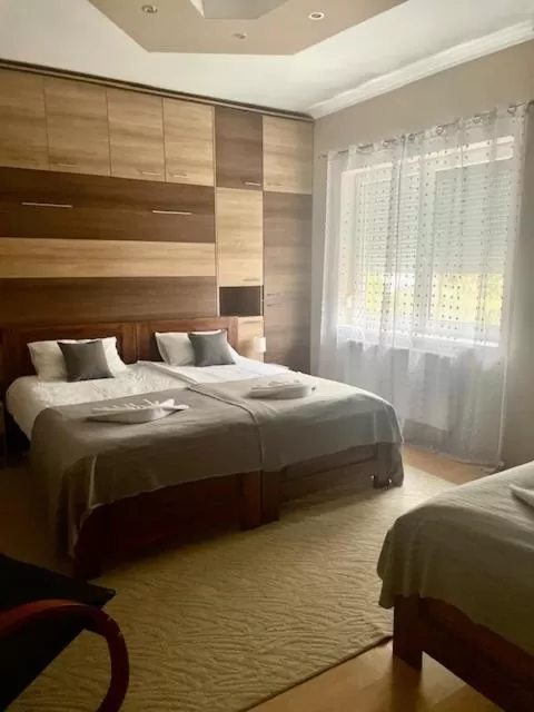 Bed in Alice Vendégház