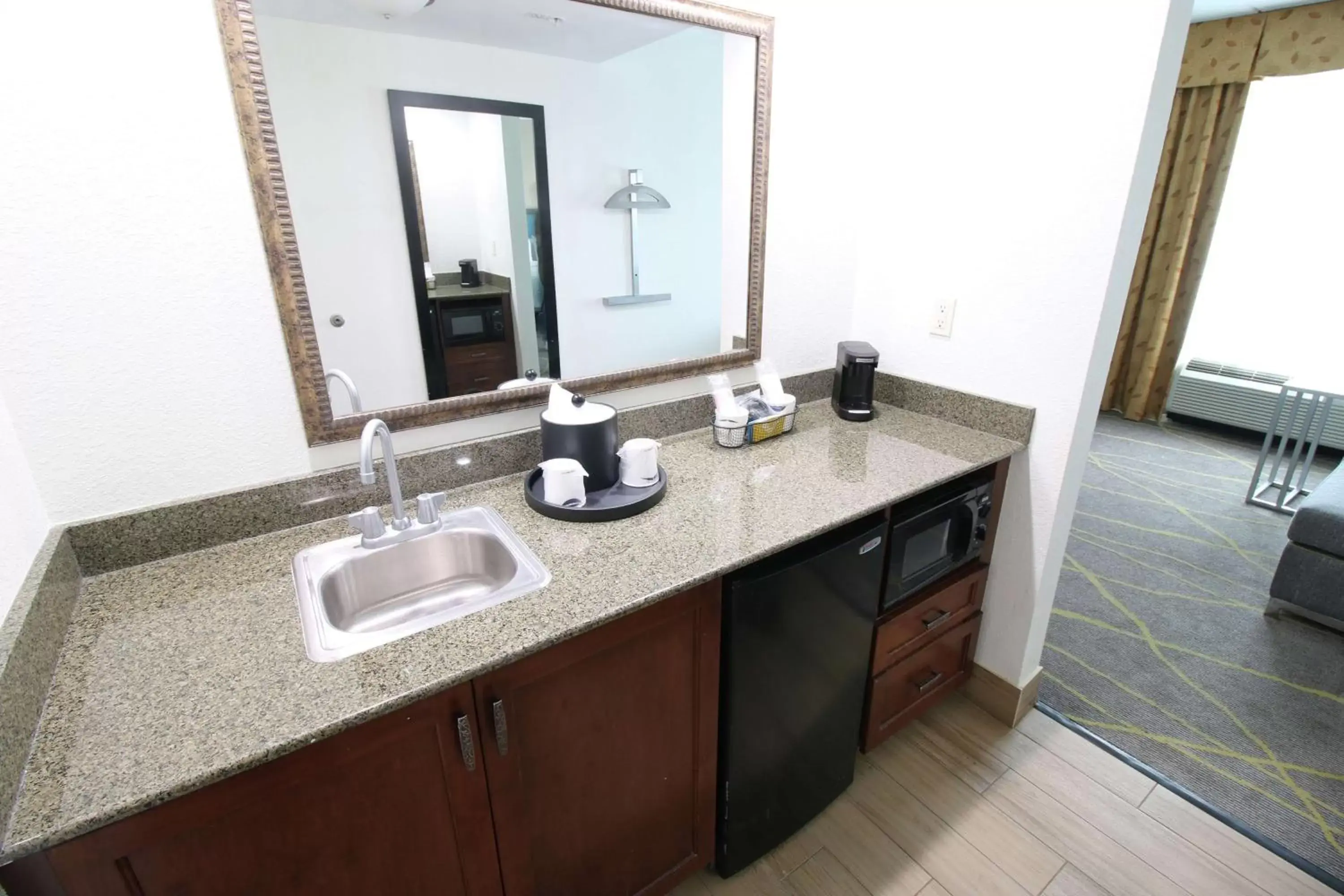 Photo of the whole room, Bathroom in Hampton Inn & Suites Palm Coast