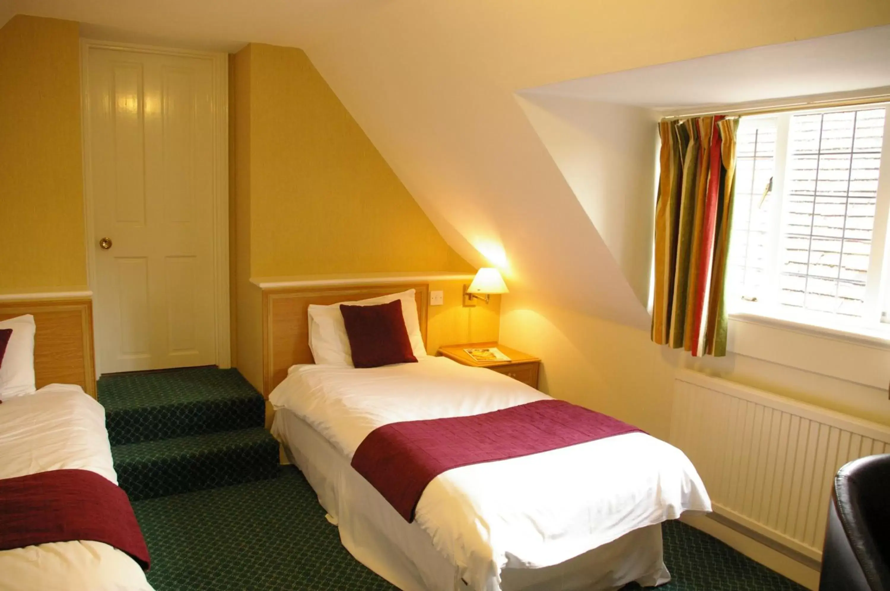 Bed in Farnham House Hotel