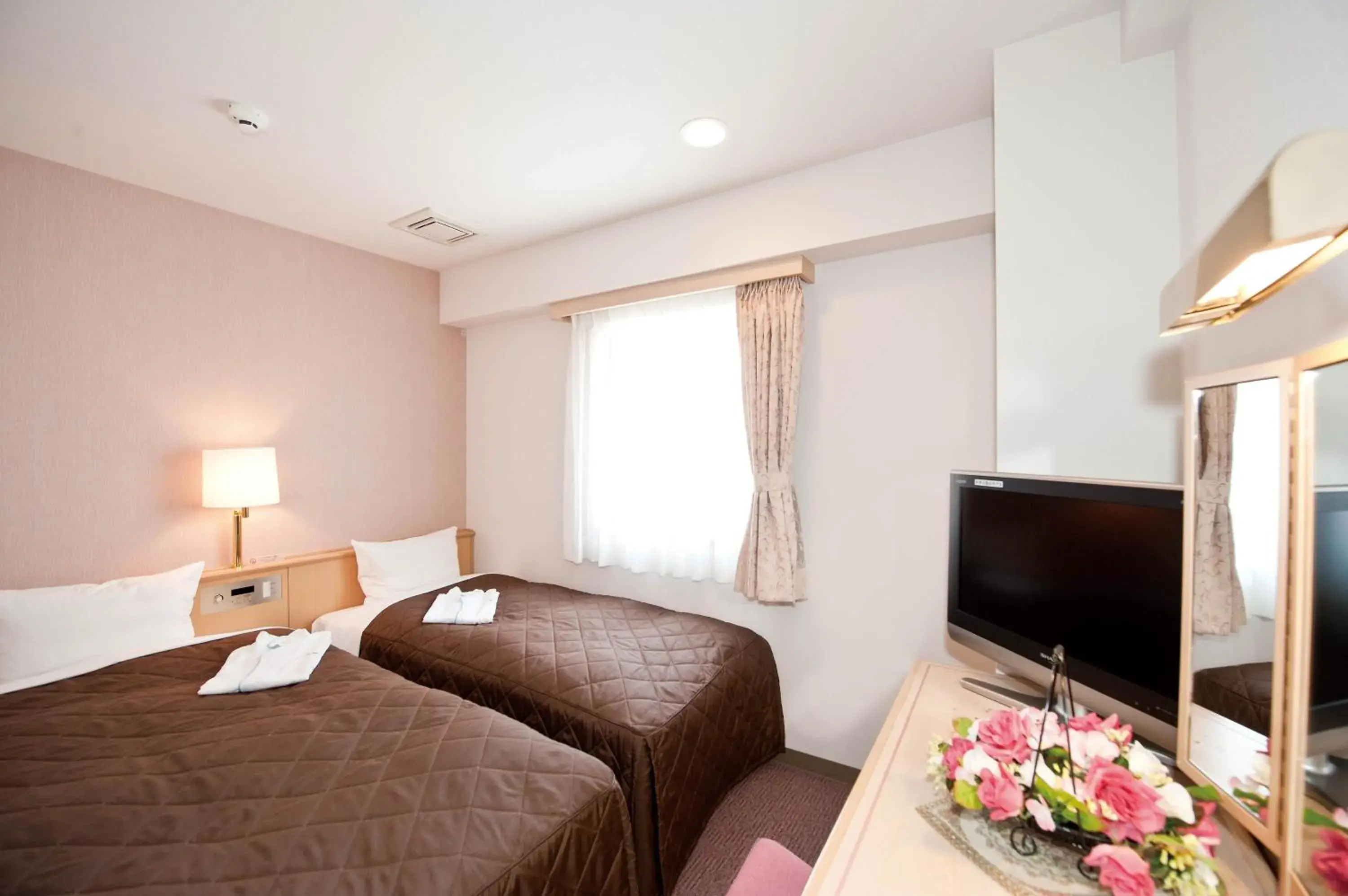 Bed in Hotel Unisite Sendai