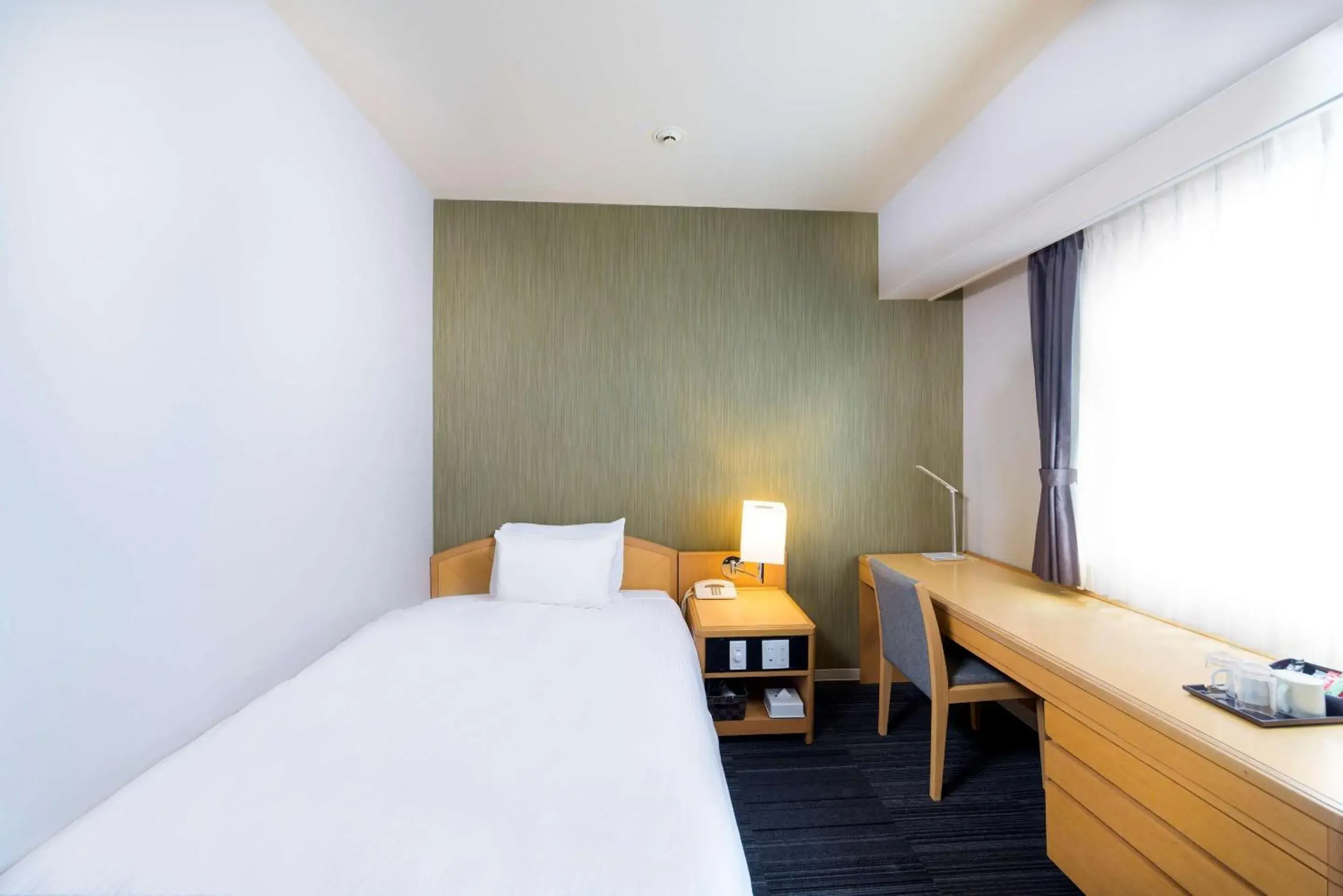 Bedroom, Bed in SureStay Plus Hotel by Best Western Shin-Osaka