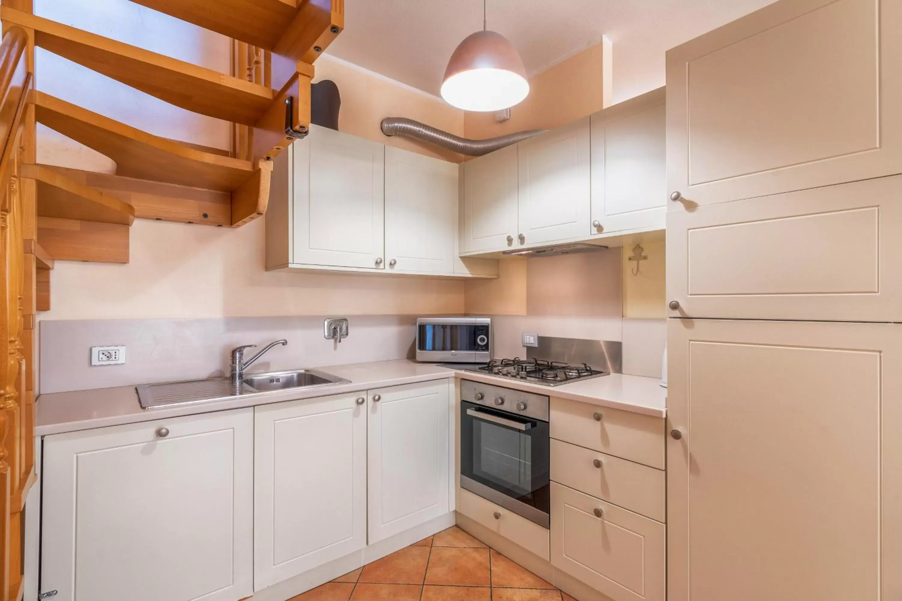 Kitchen/Kitchenette in Baba Residences