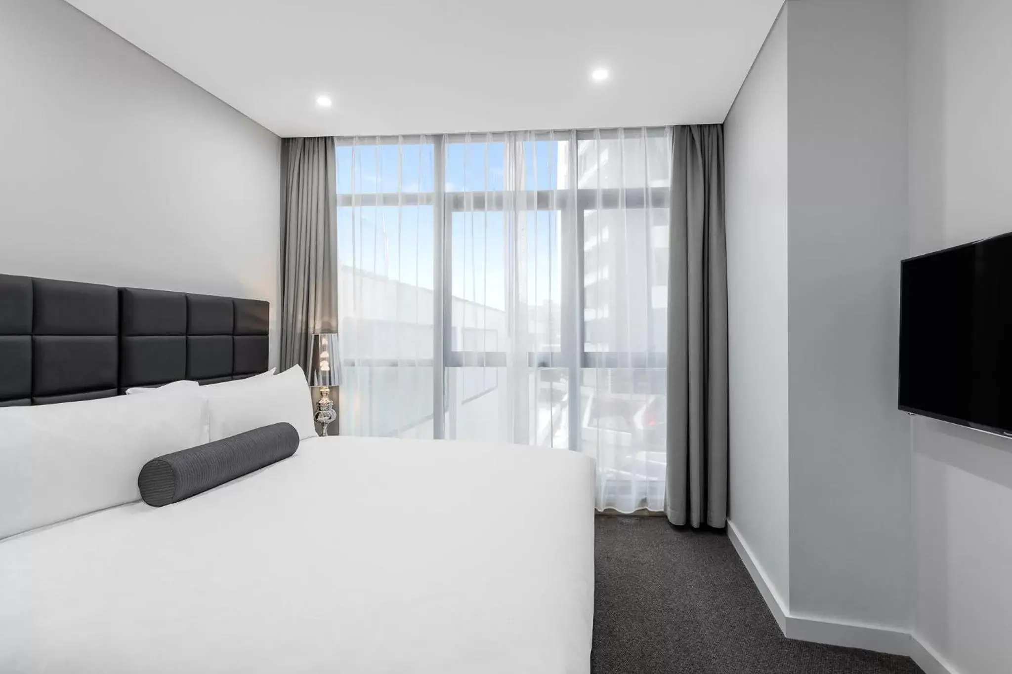 Bed in Meriton Suites Church Street, Parramatta