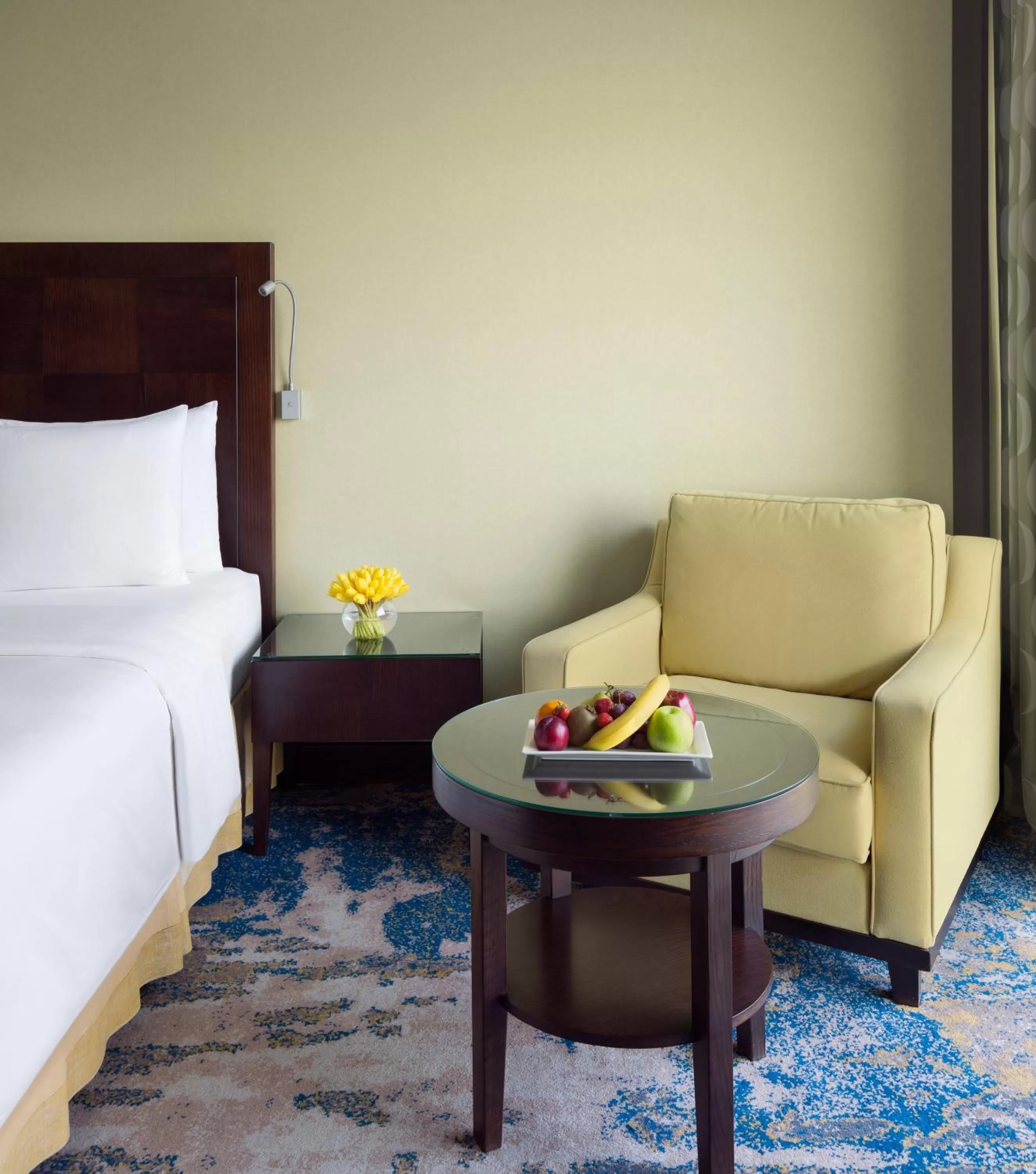 Seating area, Bed in Crowne Plaza Jeddah by IHG