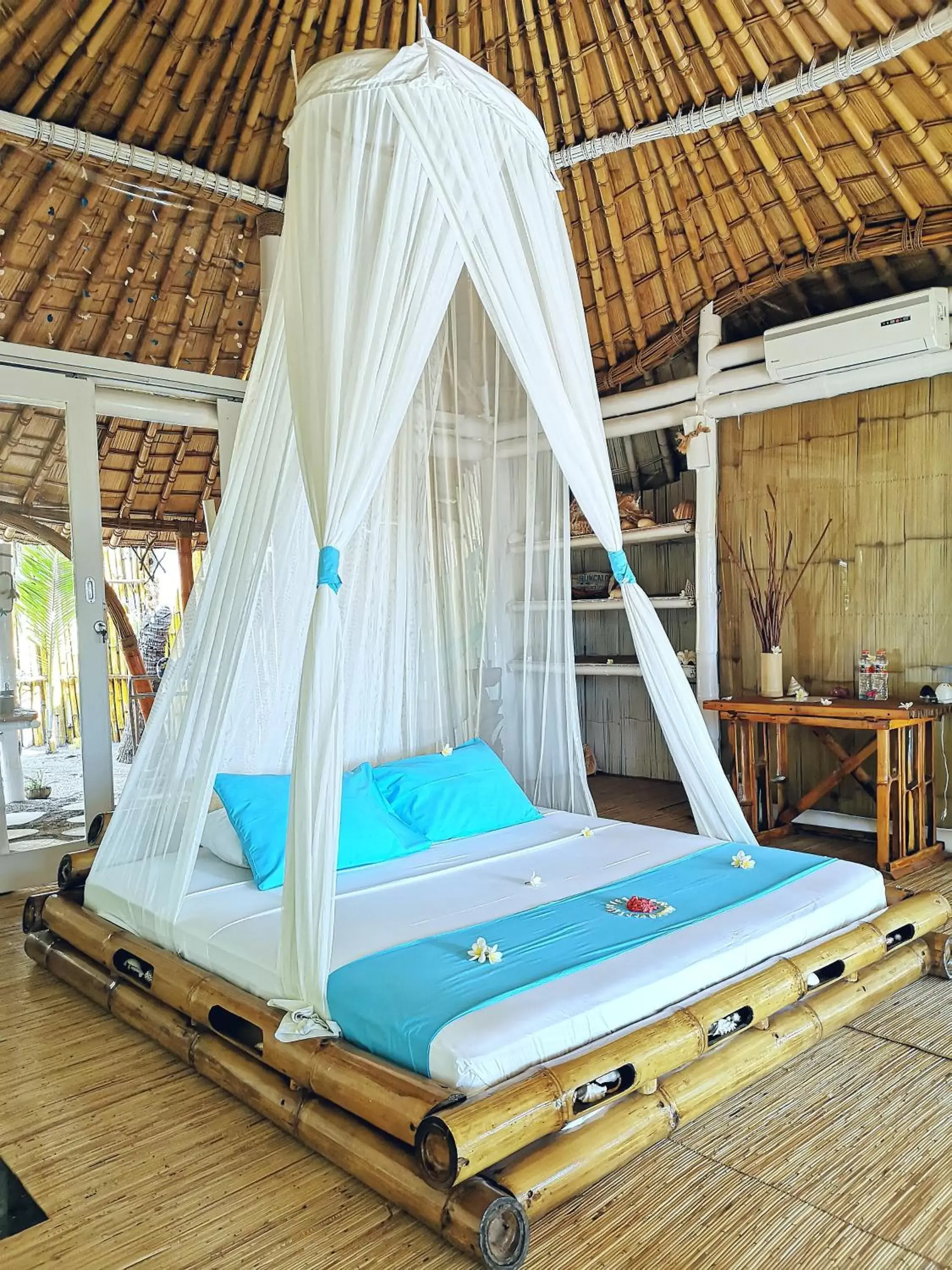 Bed in Coconut Garden Beach Resort