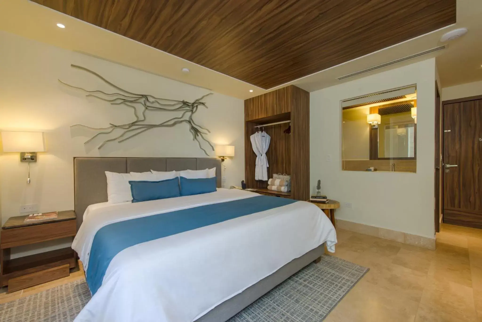 Photo of the whole room, Bed in Naay Tulum Curamoria Collection