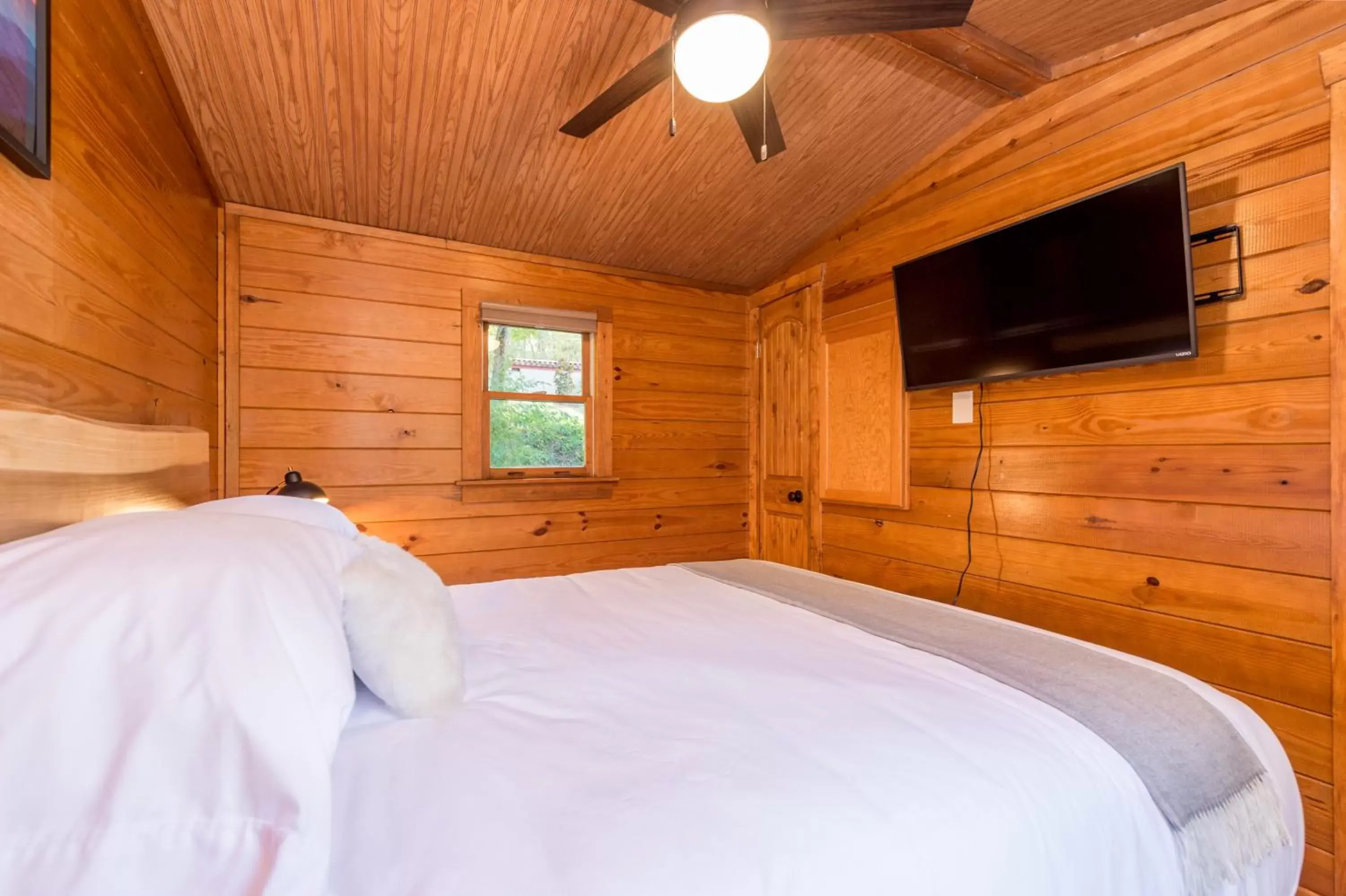 Bed in Asheville River Cabins