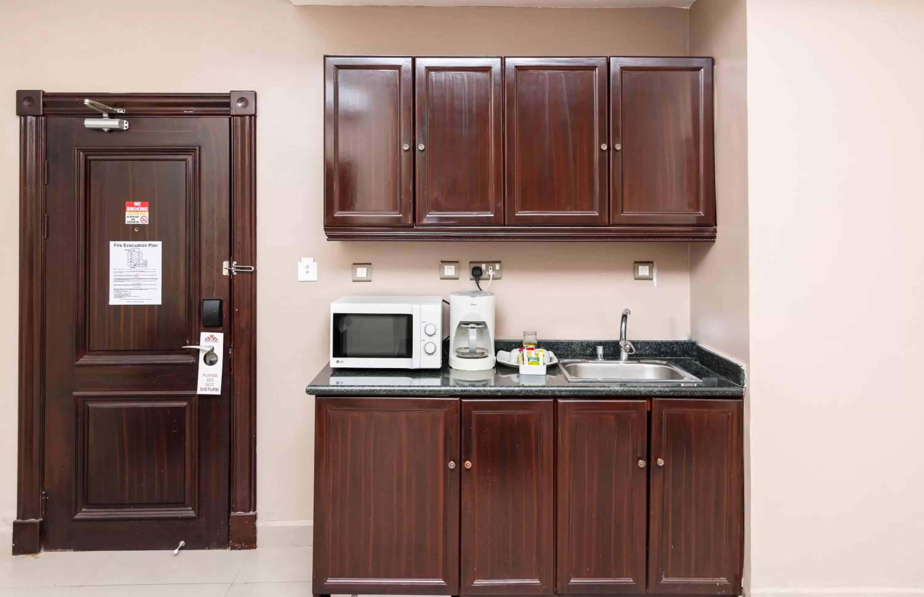 Kitchen or kitchenette in Hawthorn Suites by Wyndham Abuja
