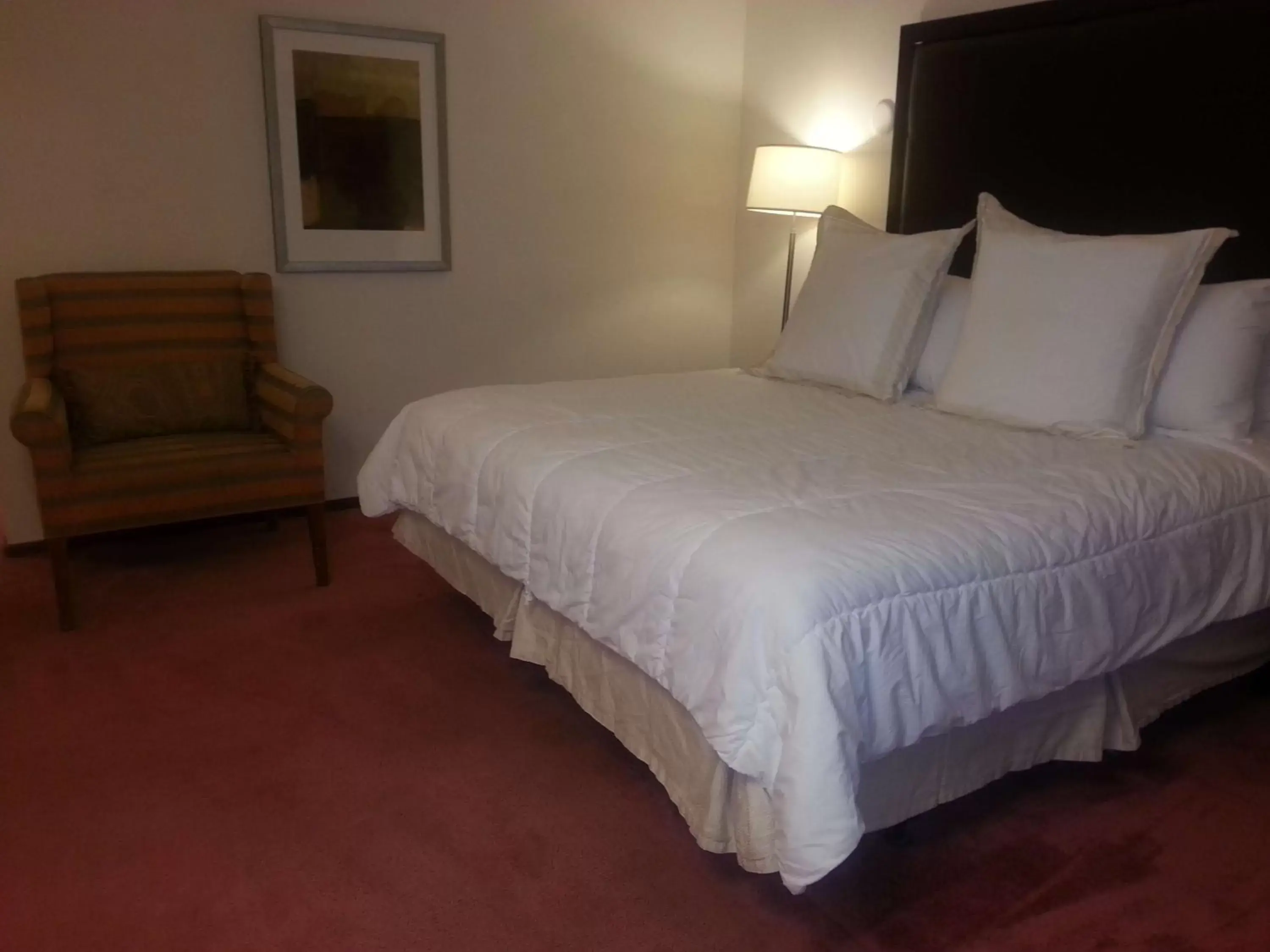 Photo of the whole room, Bed in Harlan Inn and Suites