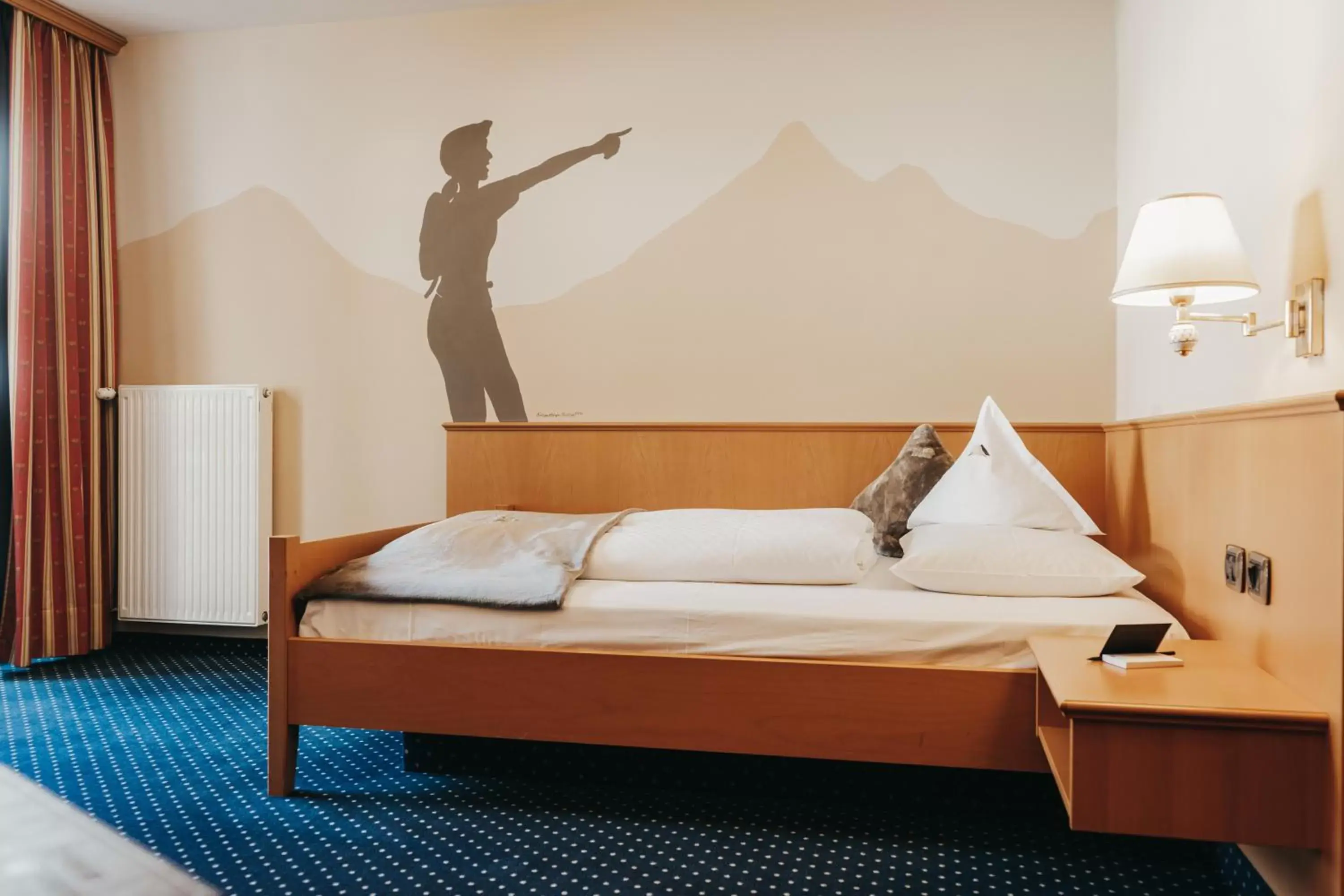 Bed in Hotel Alpenrose