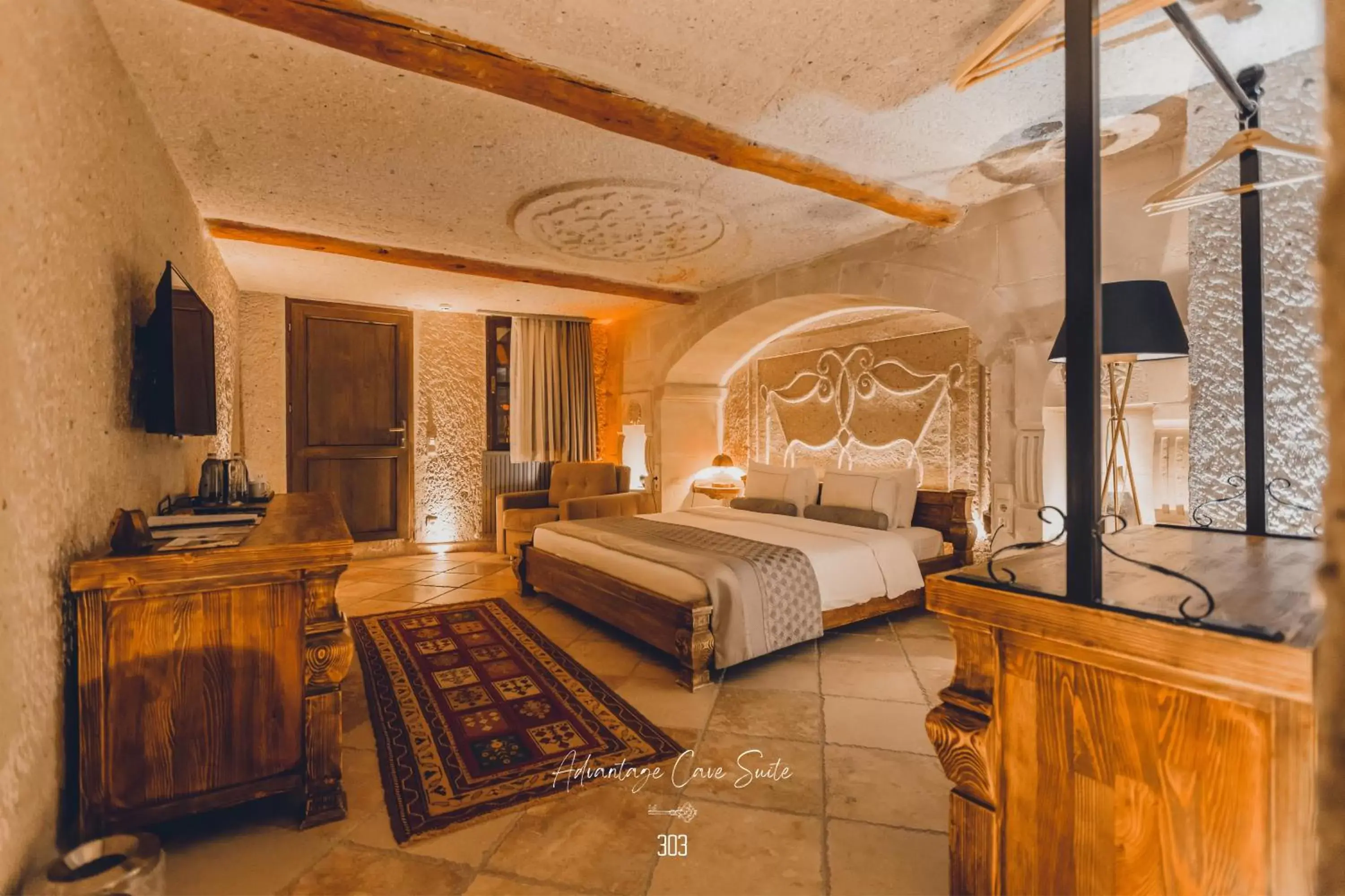 Bed in Nino Cave Suites