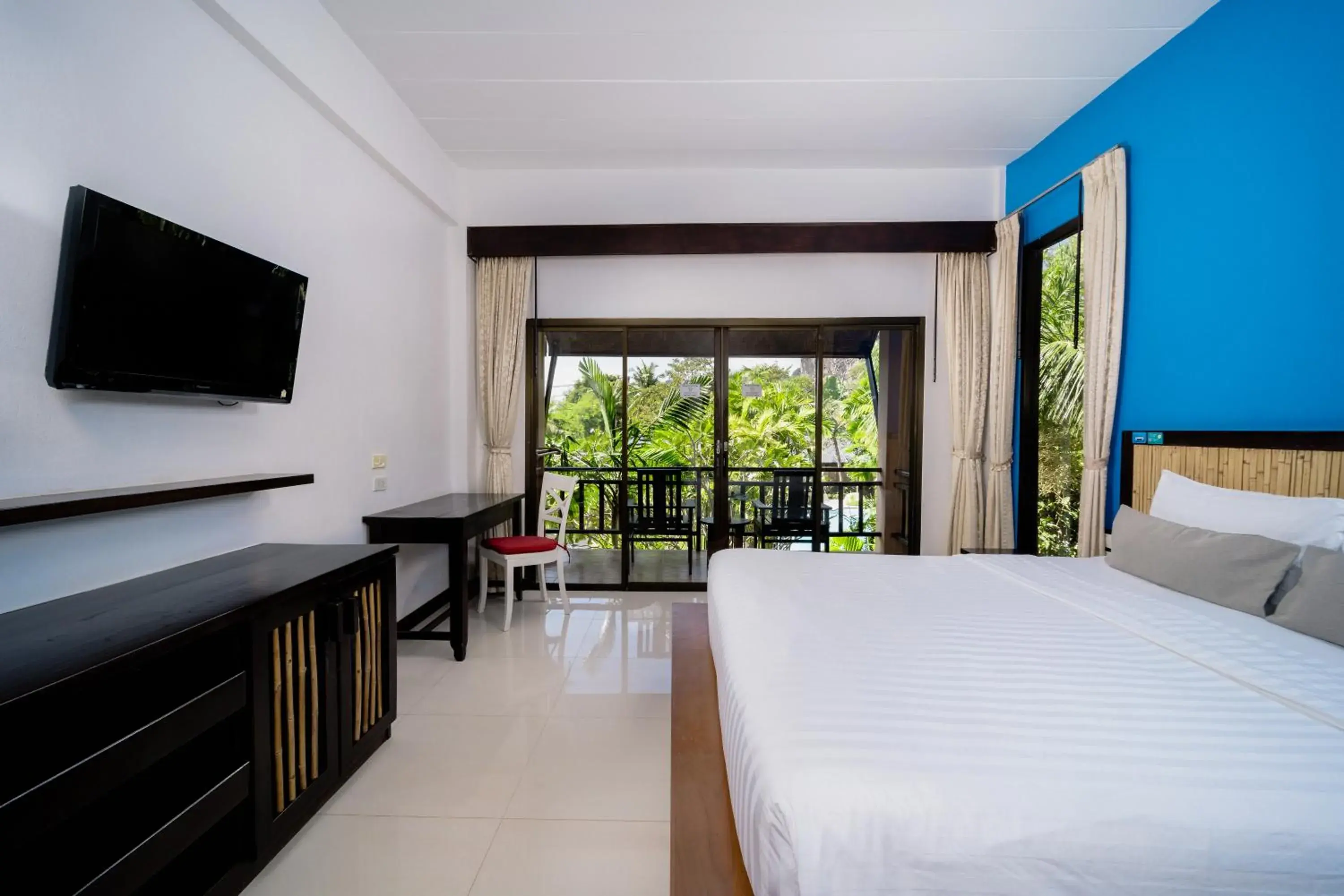 Bed, TV/Entertainment Center in Railay Princess Resort & Spa-SHA Extra Plus