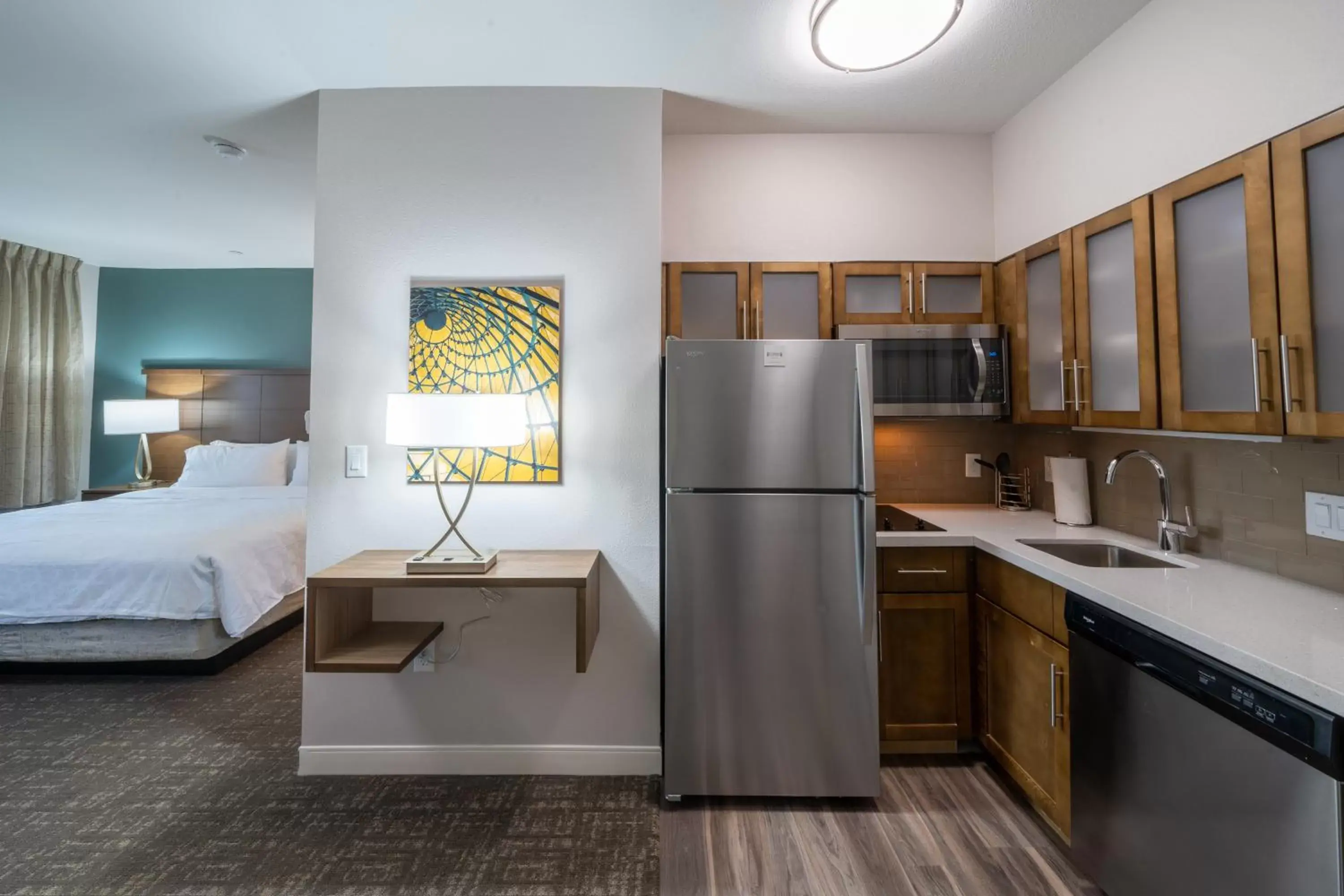 Kitchen/Kitchenette in Staybridge Suites Houston East - Baytown, an IHG Hotel