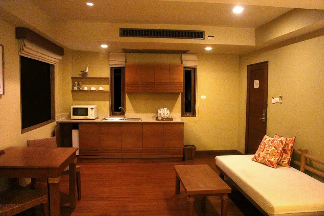 Kitchen or kitchenette, Seating Area in Deva Beach Resort Samui