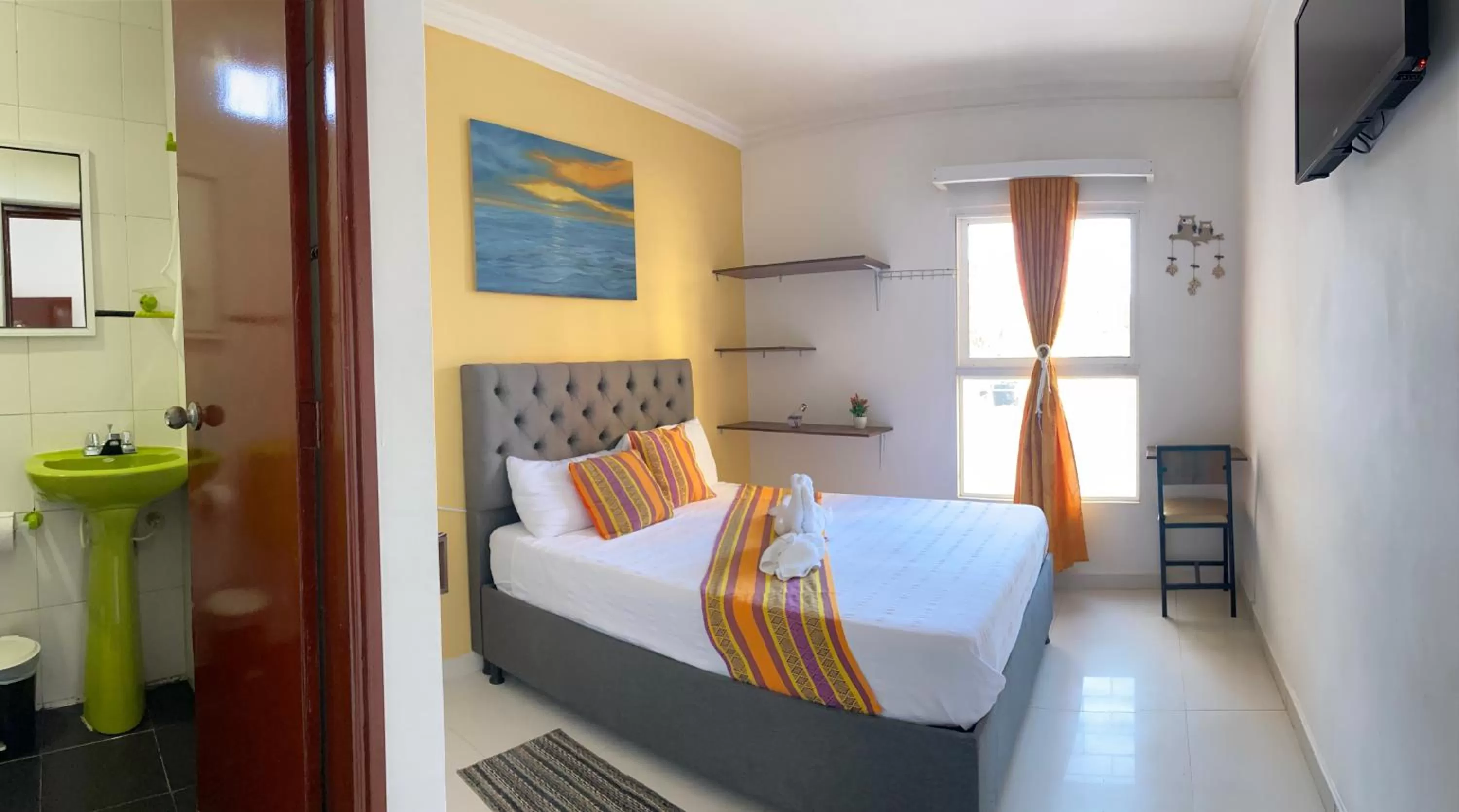 Bed in ANAJIRAWAA HOTEL