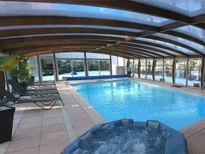 Swimming Pool in Logis Hotel-Restaurant Spa Le Lac