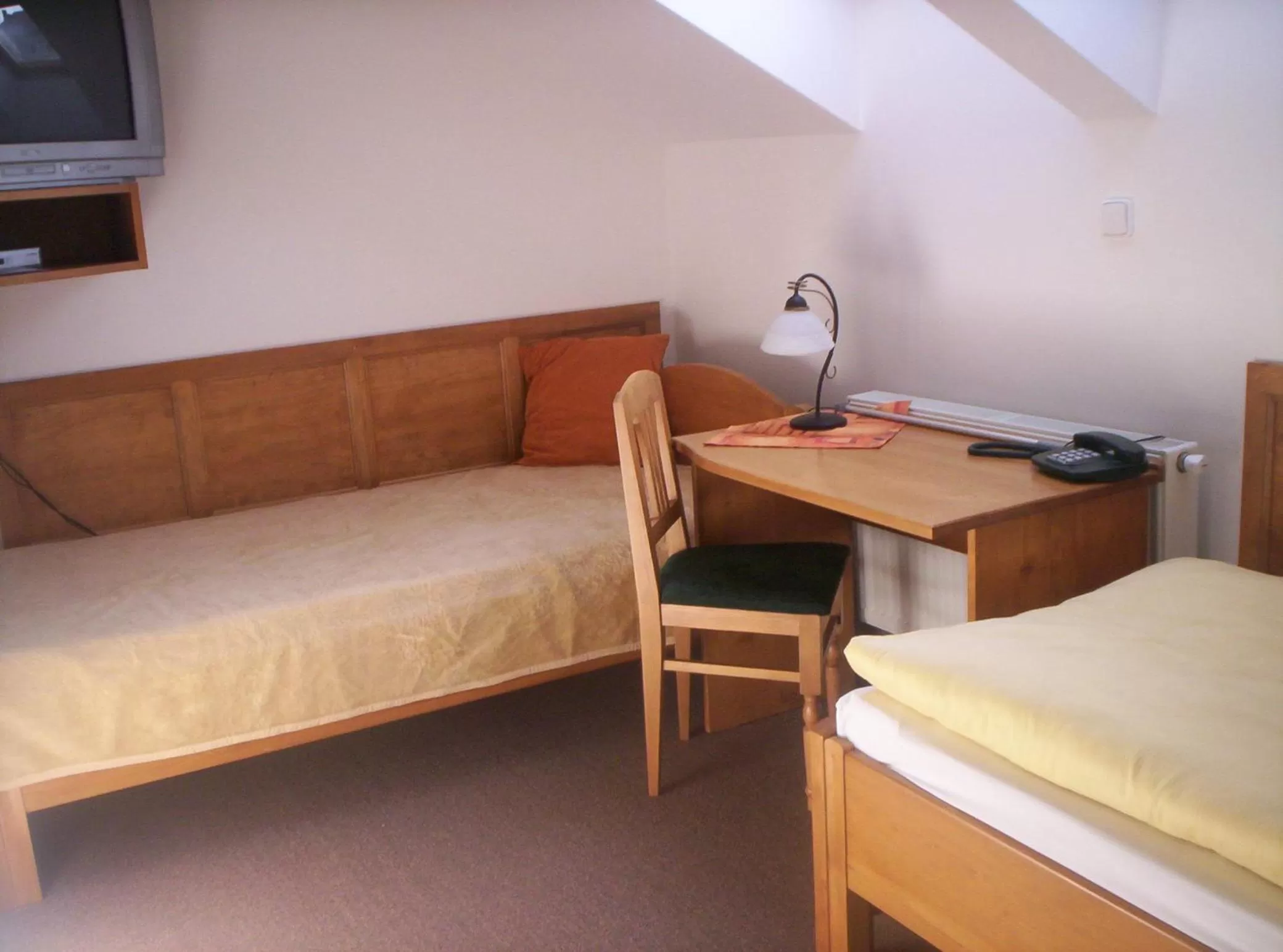 Bed in Hotel Krakonoš