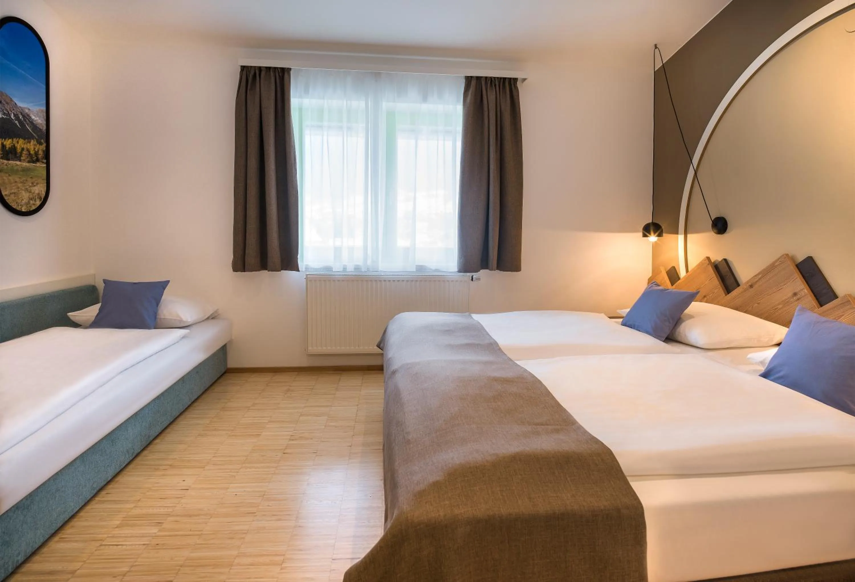 Photo of the whole room, Bed in JUFA Hotel Wipptal