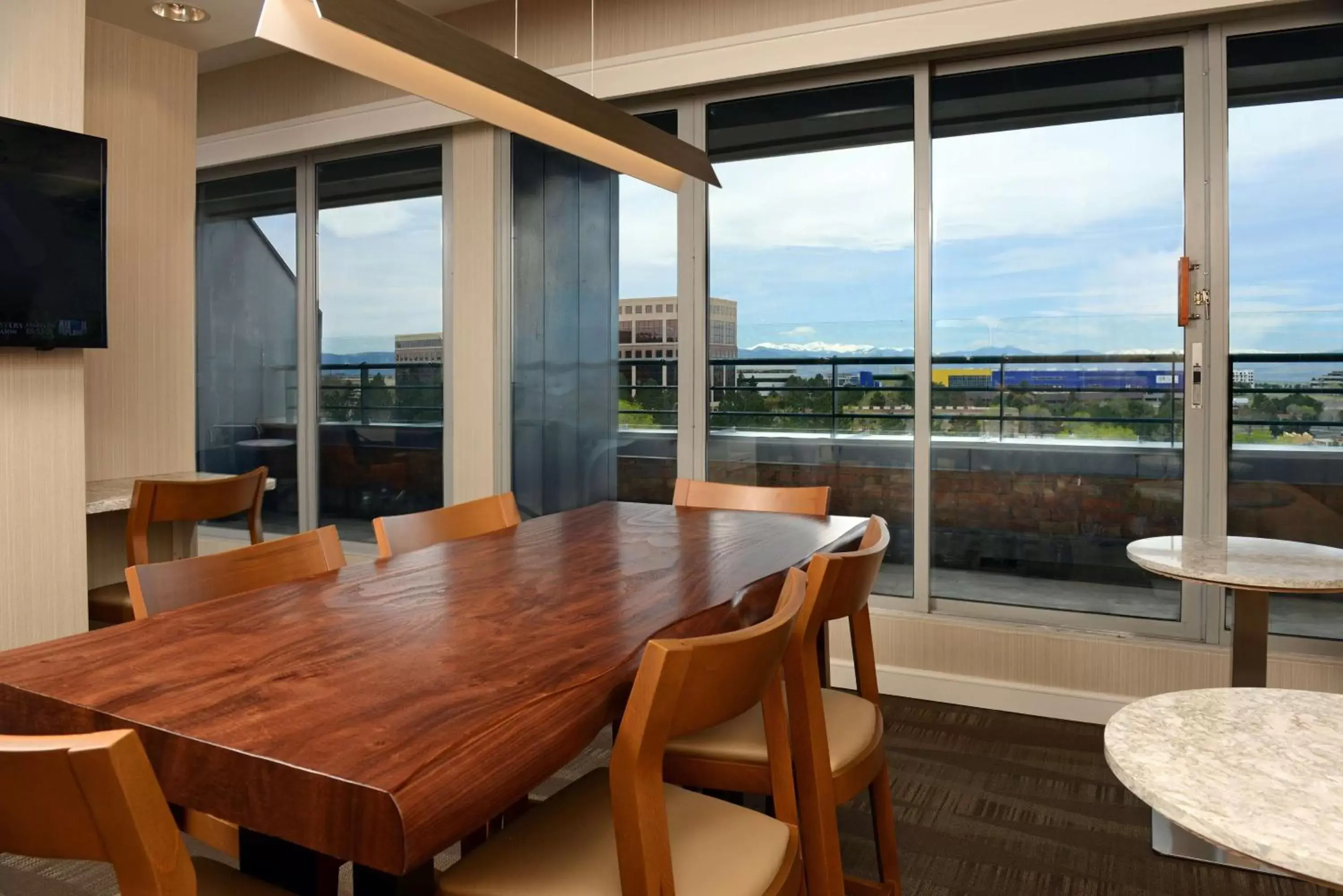 Living room in The Inverness Denver, a Hilton Golf & Spa Resort