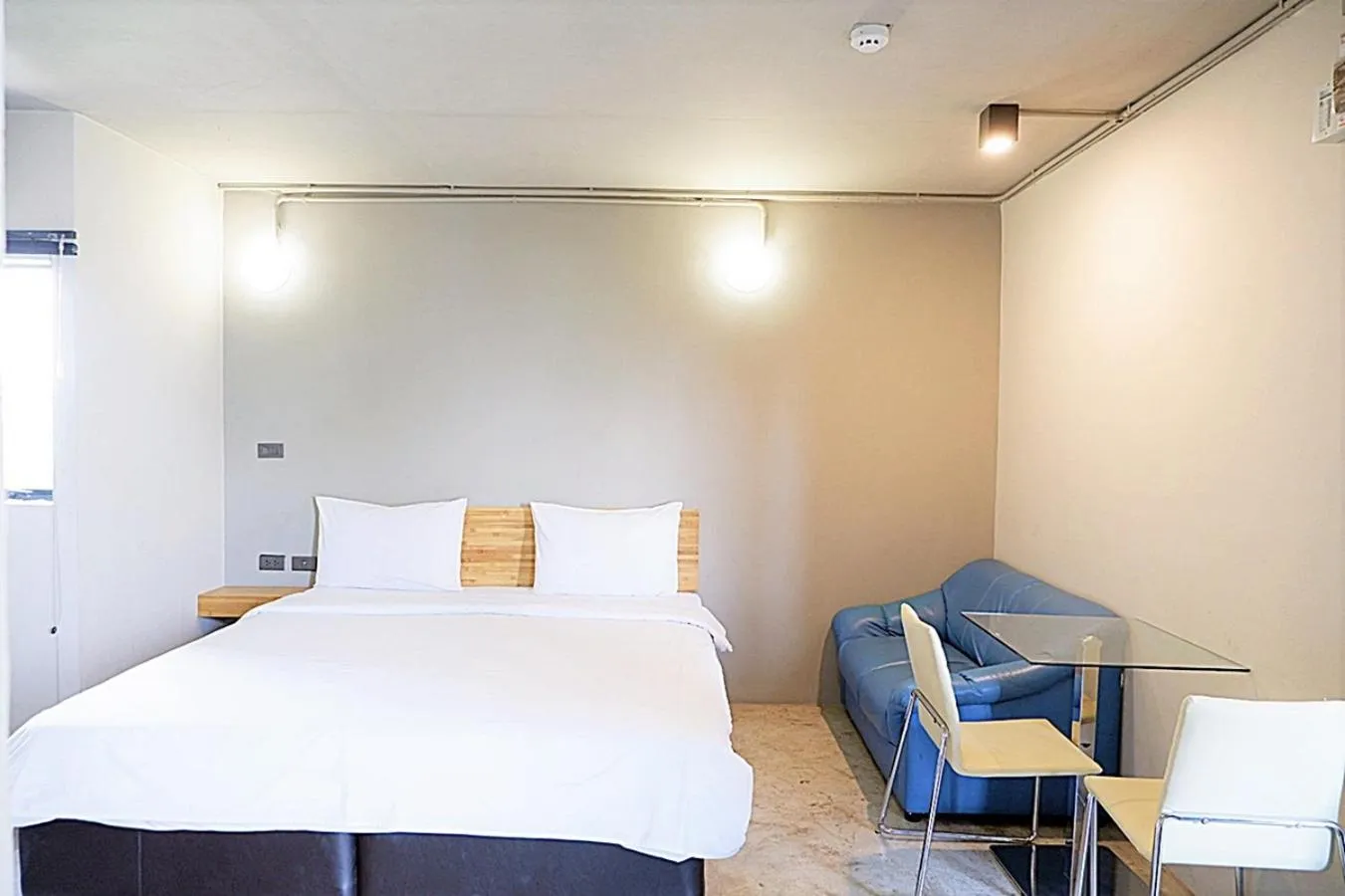 Bed in Izen Plus Budget Hotel & Residence