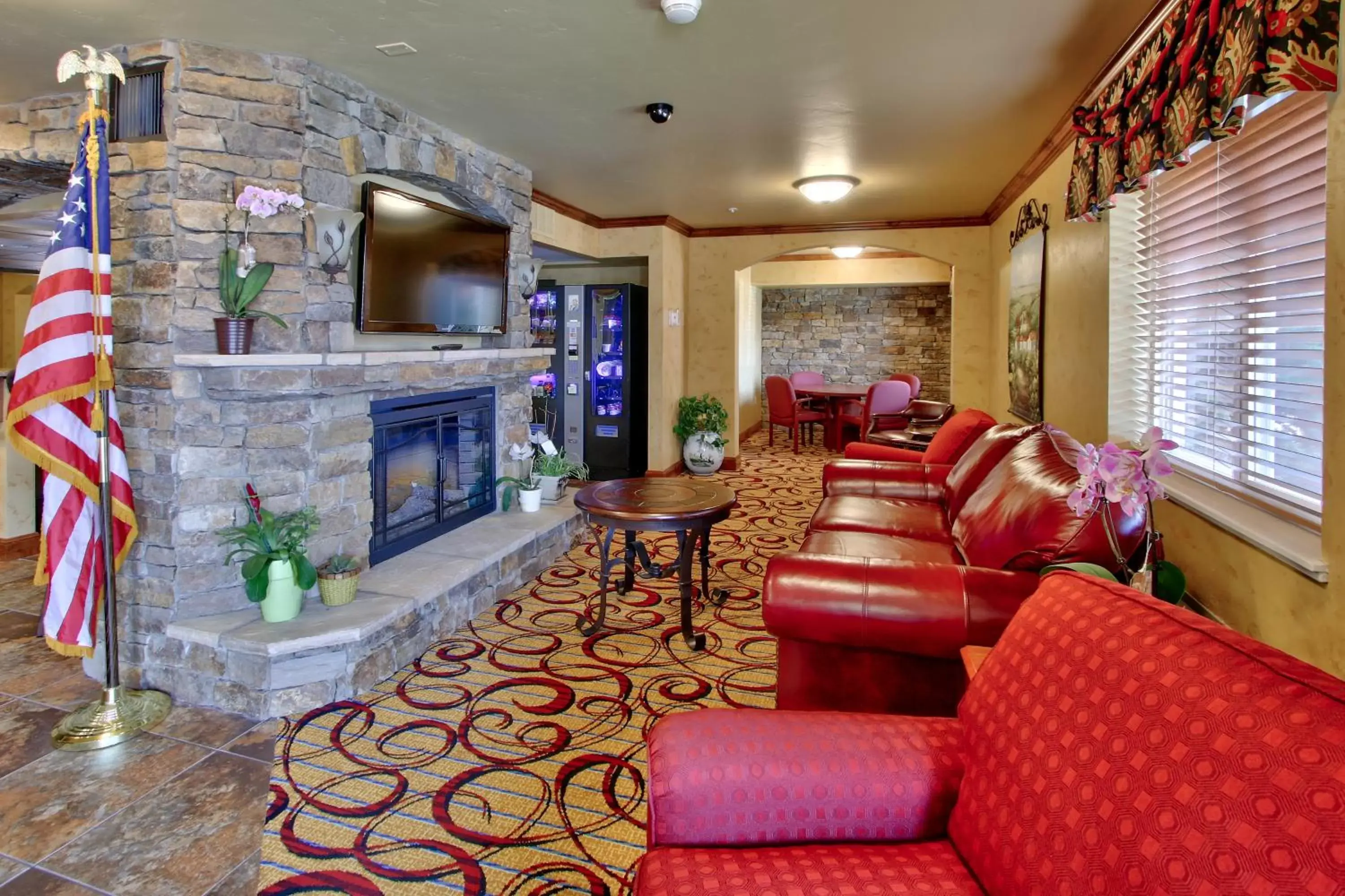 Communal lounge/ TV room, Seating Area in MCM Elegante Suites