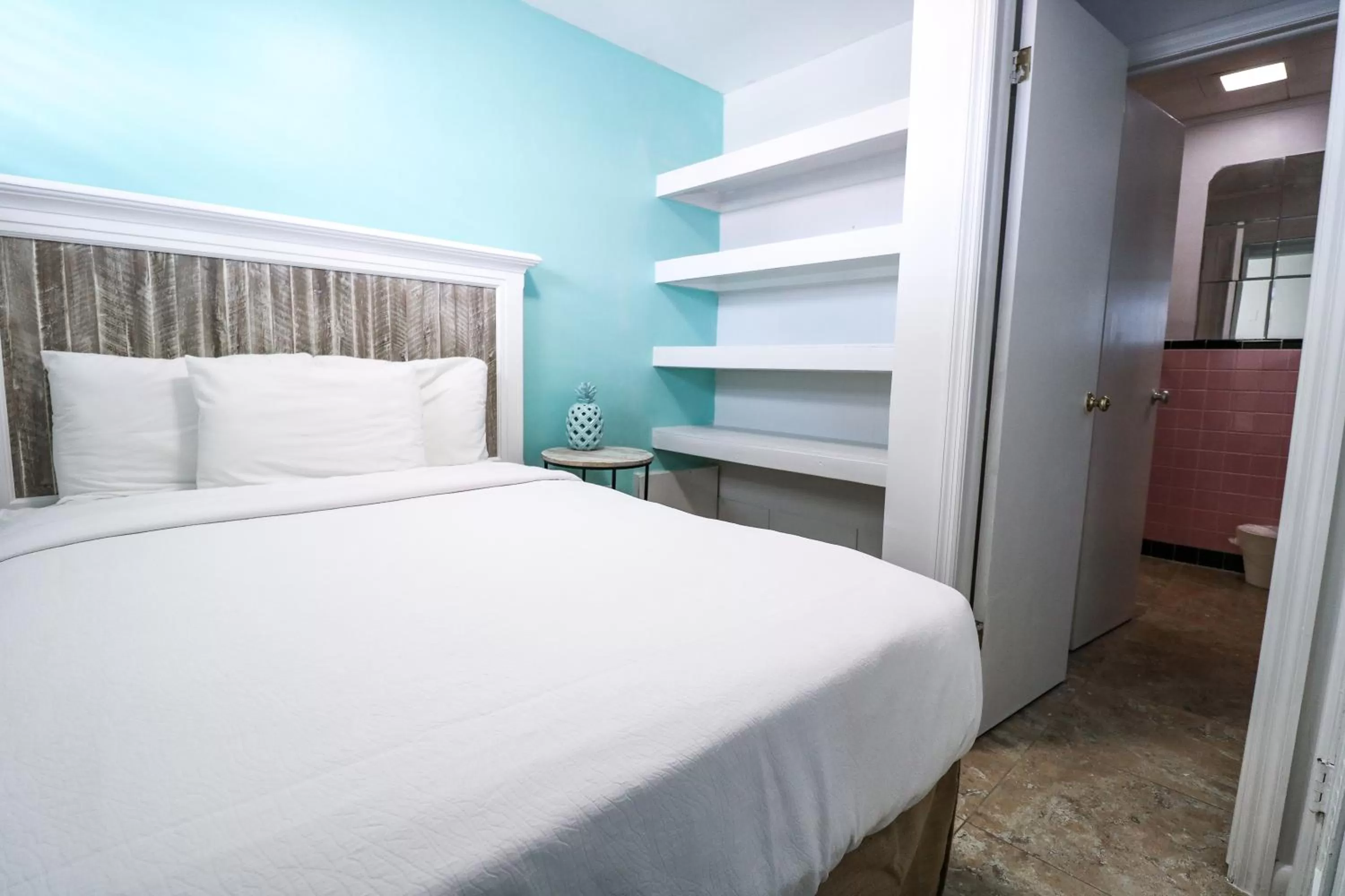 Bed in Drop Anchor Resort & Marina