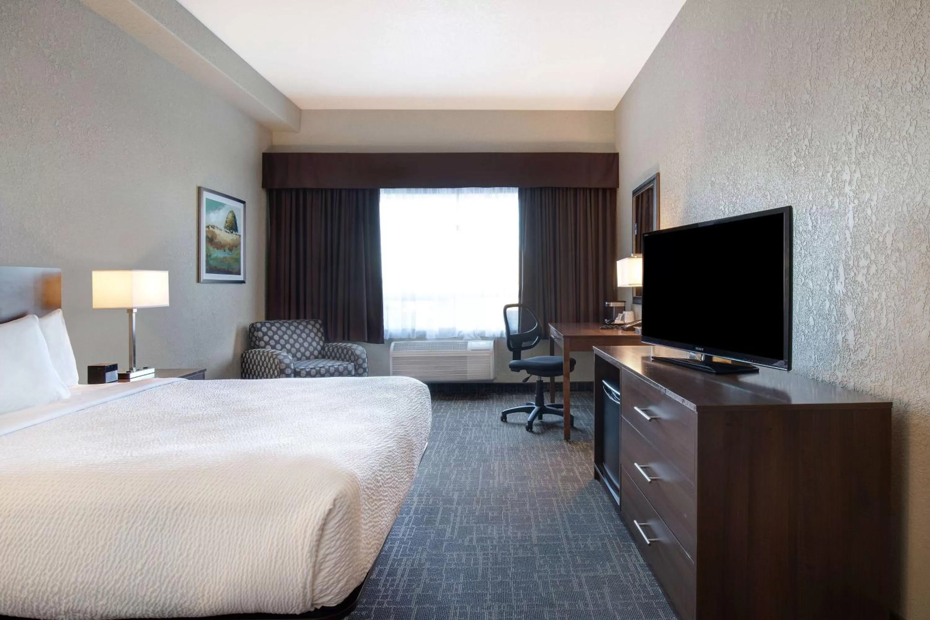 Photo of the whole room, Bed in Days Inn & Suites by Wyndham Yorkton