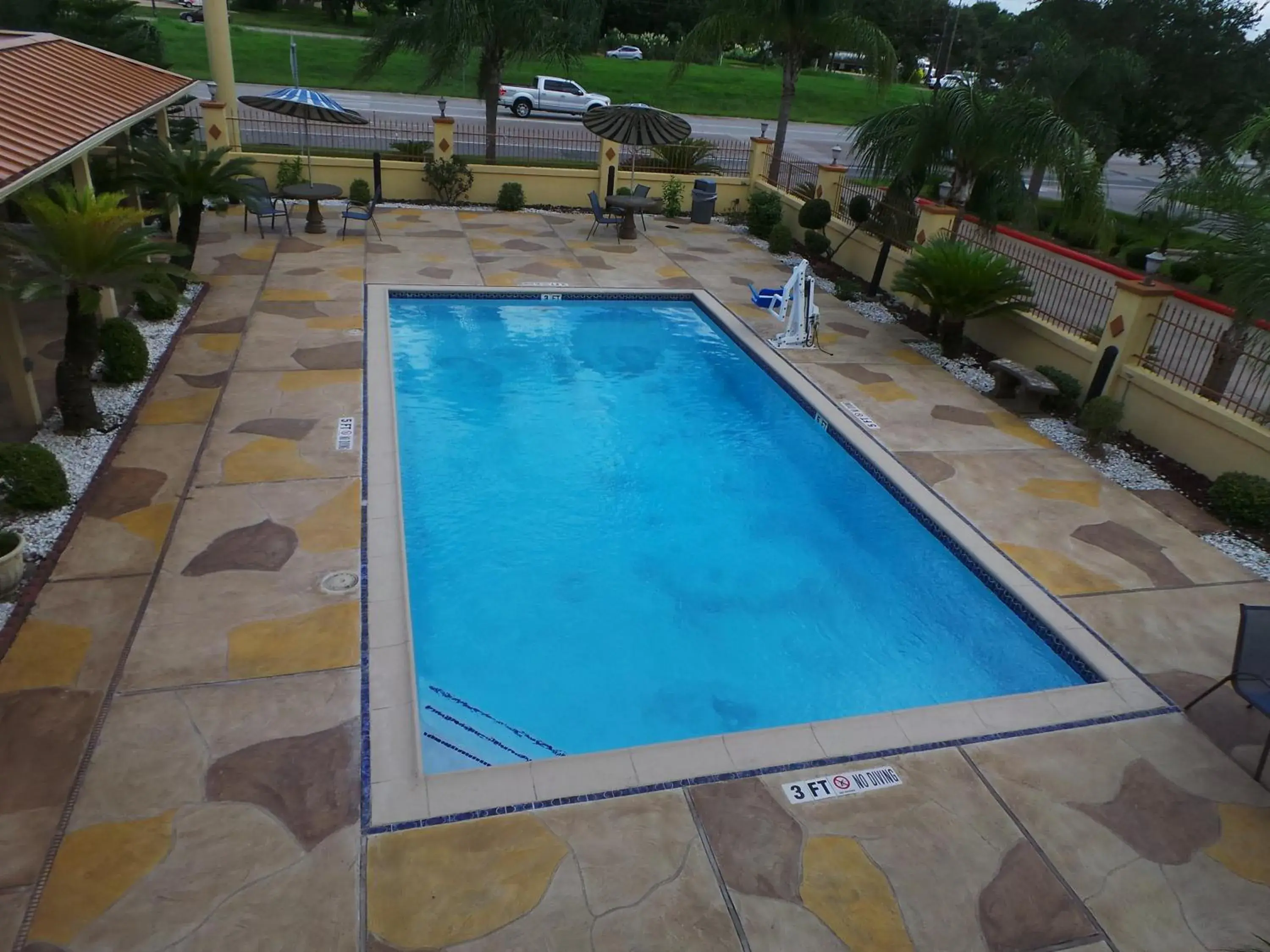 Patio, Pool View in Americas Best Value Inn & Suites Alvin Houston