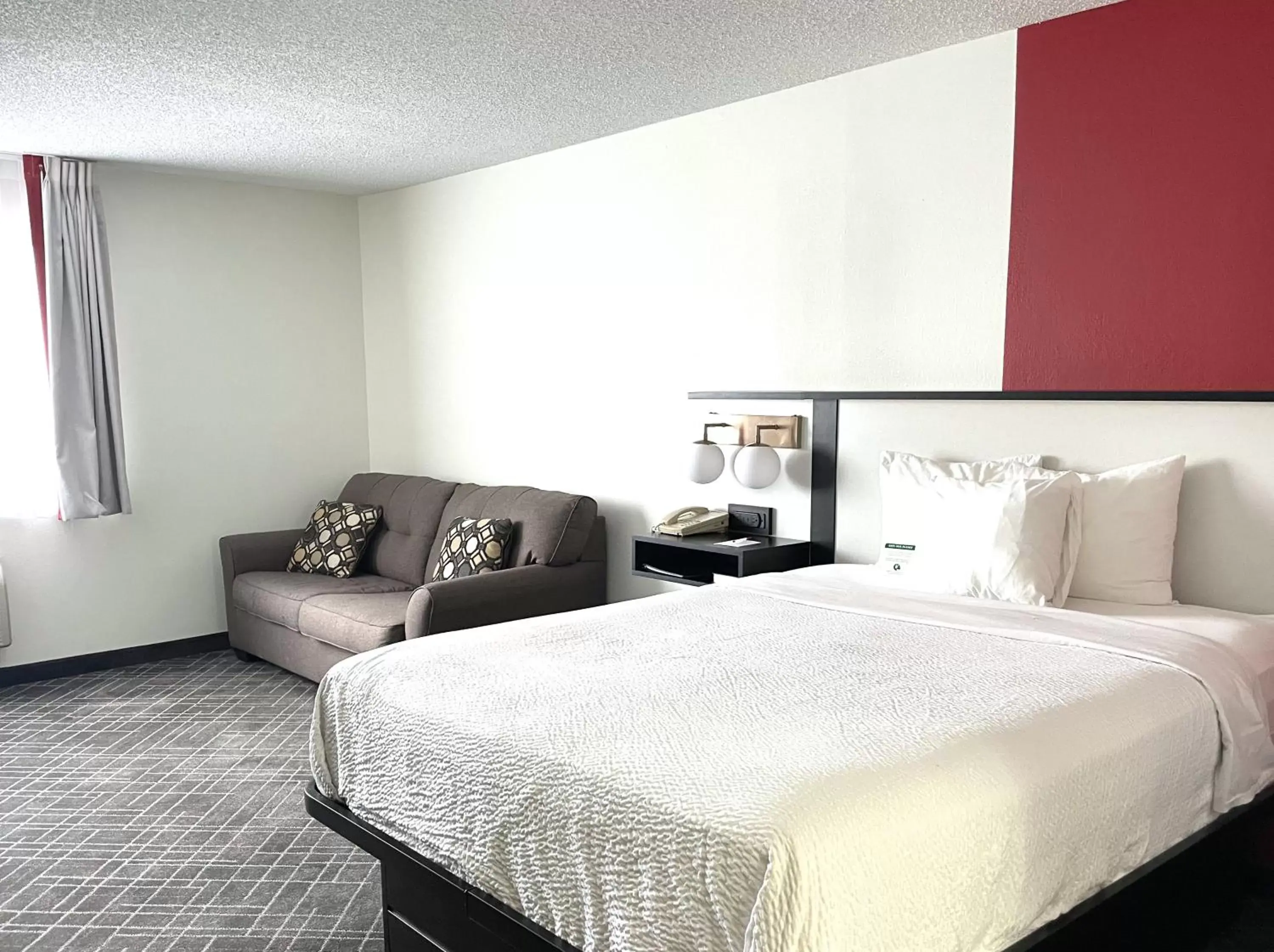 Bed in Ramada by Wyndham Waupaca