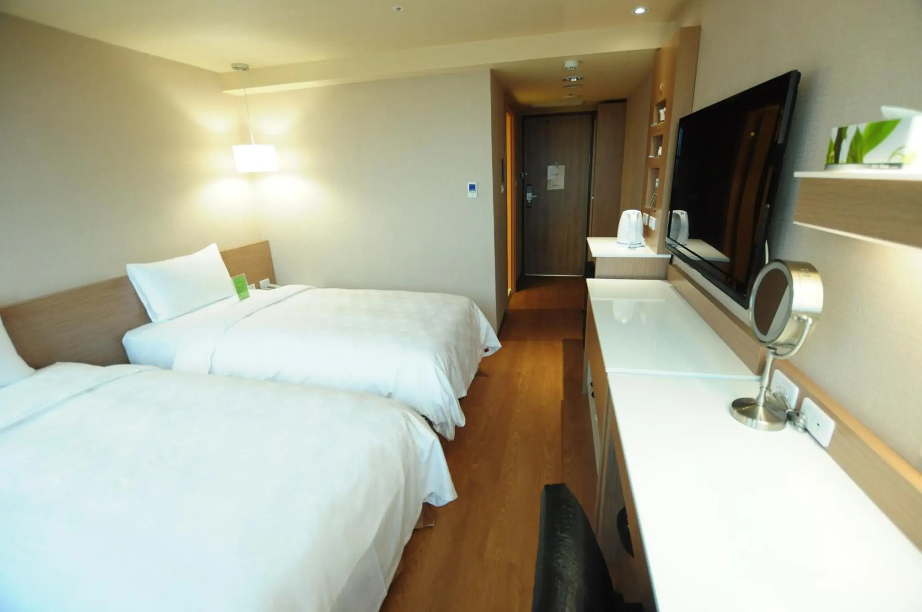 Photo of the whole room, Bed in Kindness Hotel - Kaohsiung Main Station