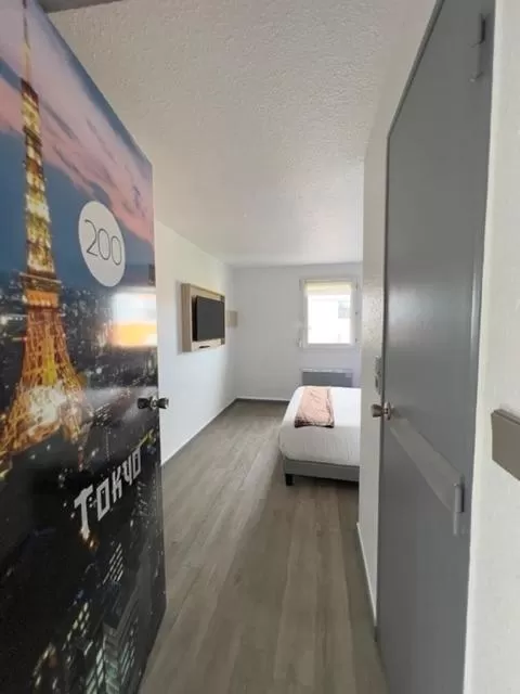 Photo of the whole room, Bed in Kyriad Direct Reims Bezannes