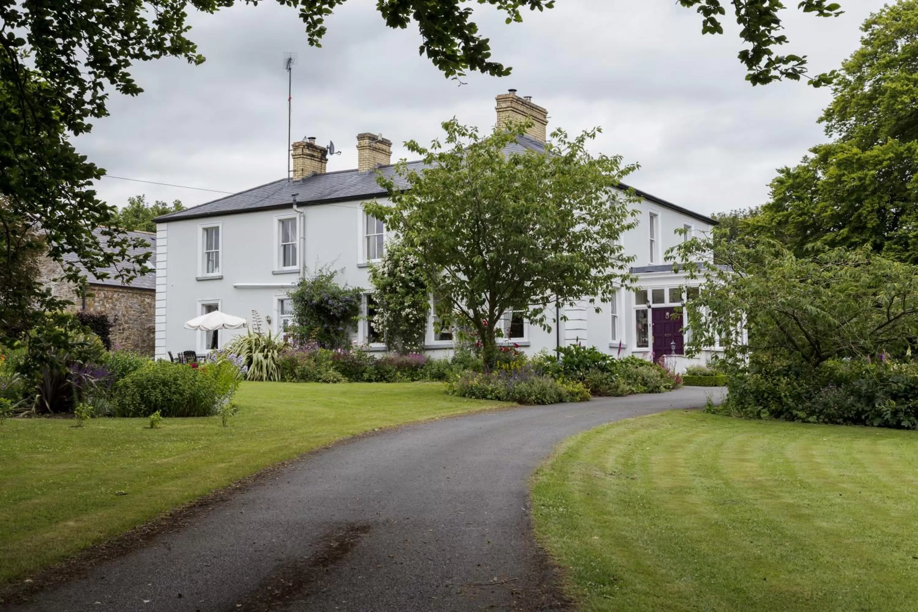Facade/entrance, Garden in College Hill House