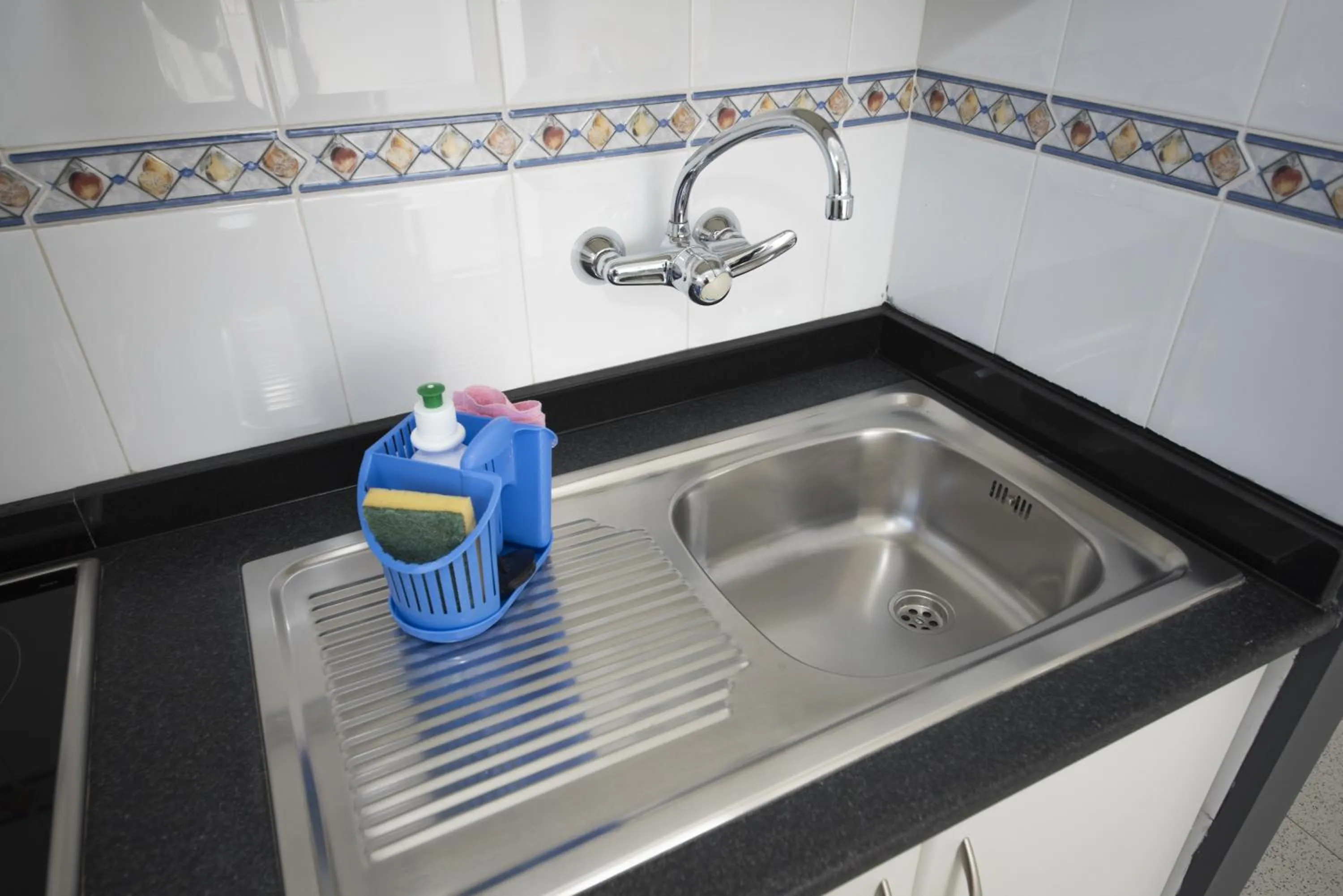 Kitchen or kitchenette in Apartamentos Jable Bermudas