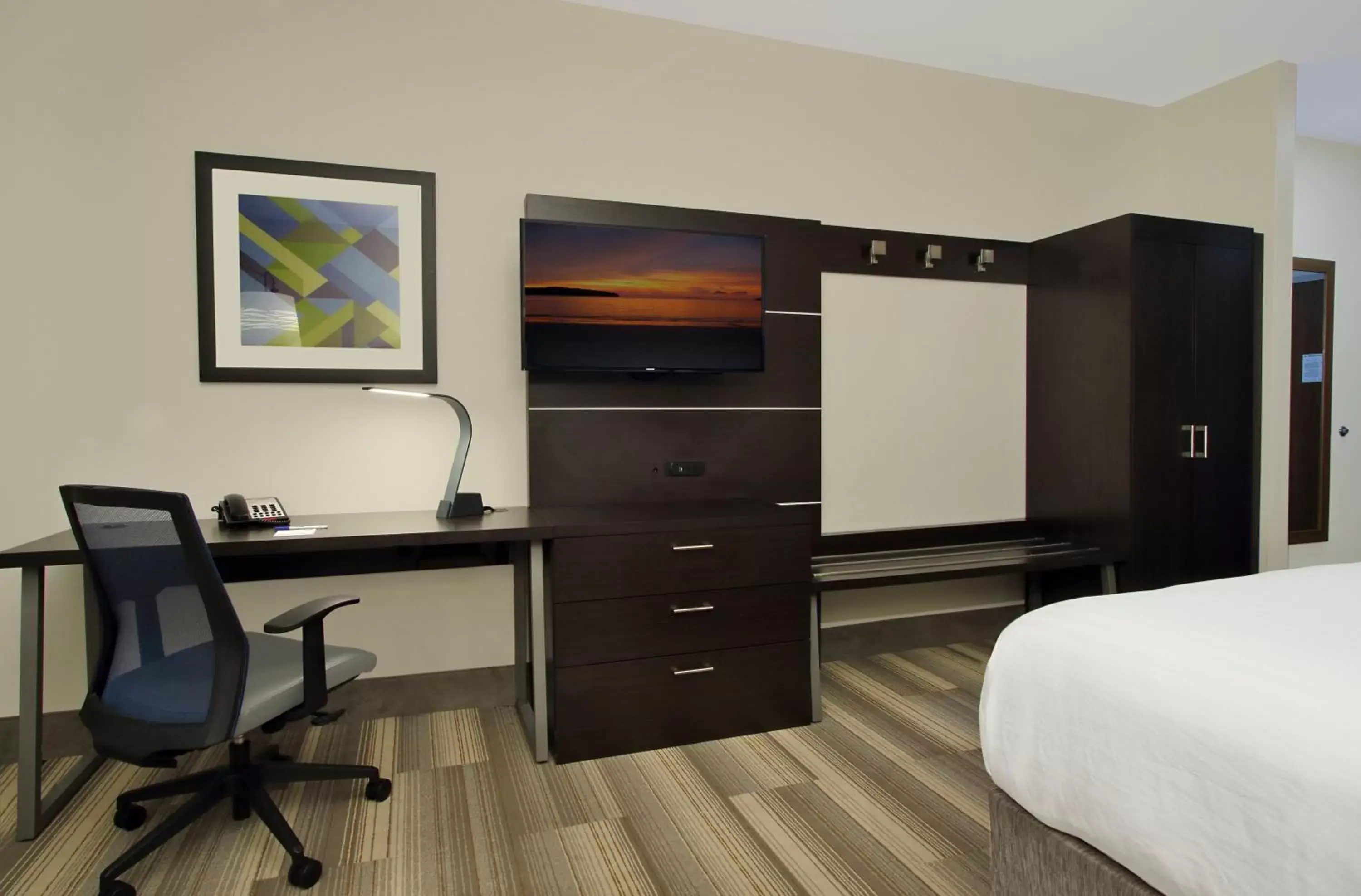 Photo of the whole room, TV/Entertainment Center in Holiday Inn Express & Suites - Brookshire - Katy Freeway, an IHG Hotel