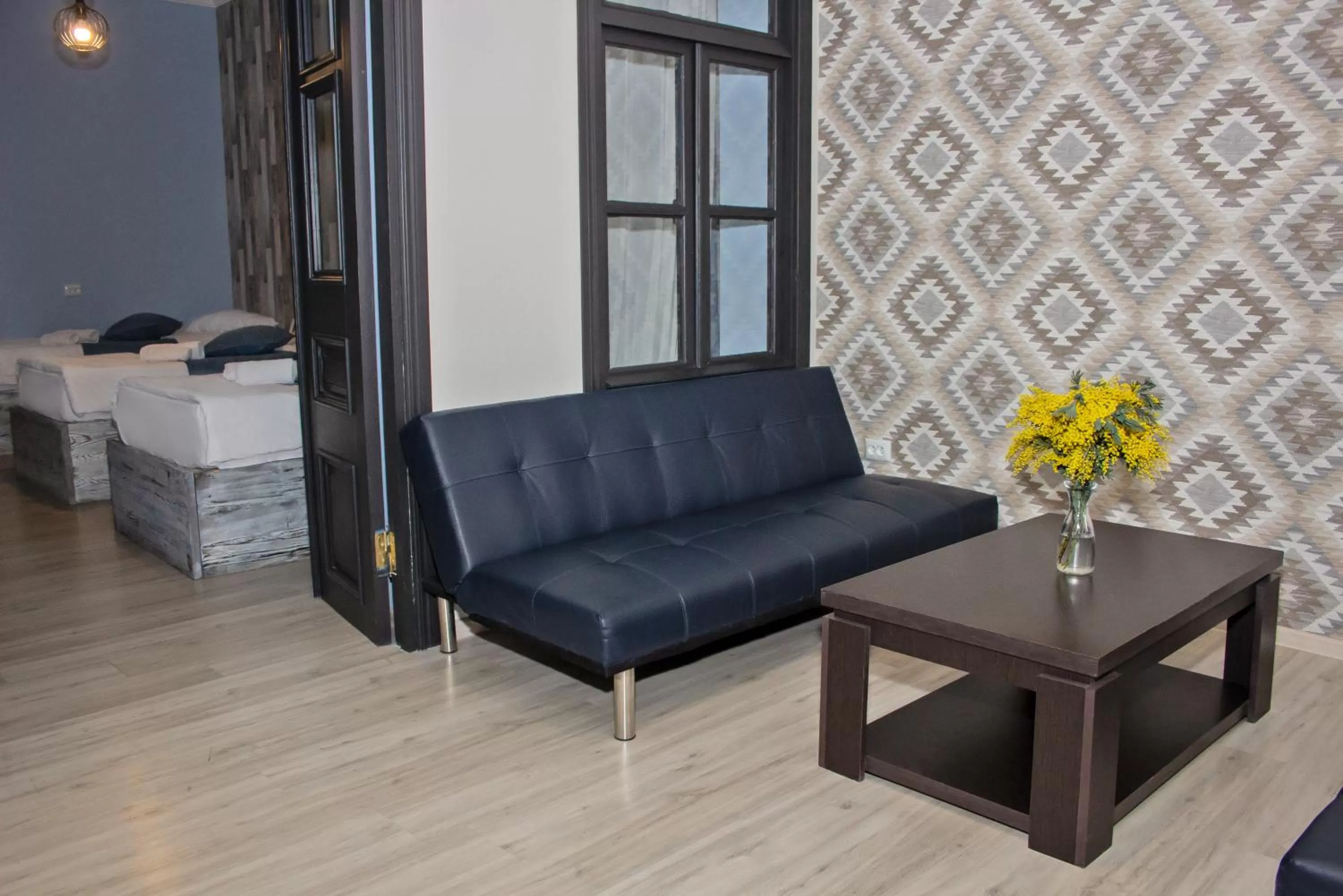 Living room, Bed in Check Point Hotel