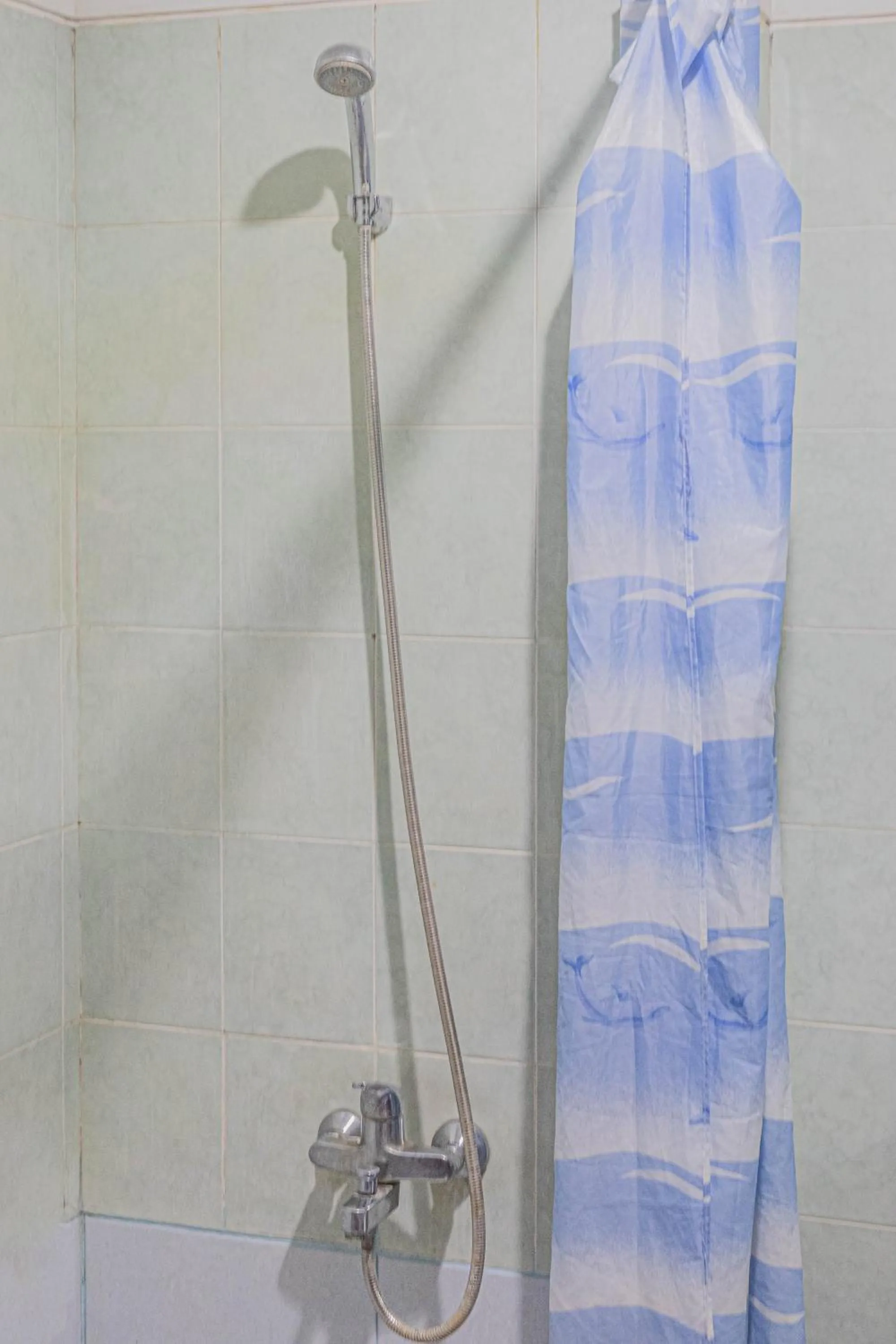 Shower in Puri Mango Guest House Sanur